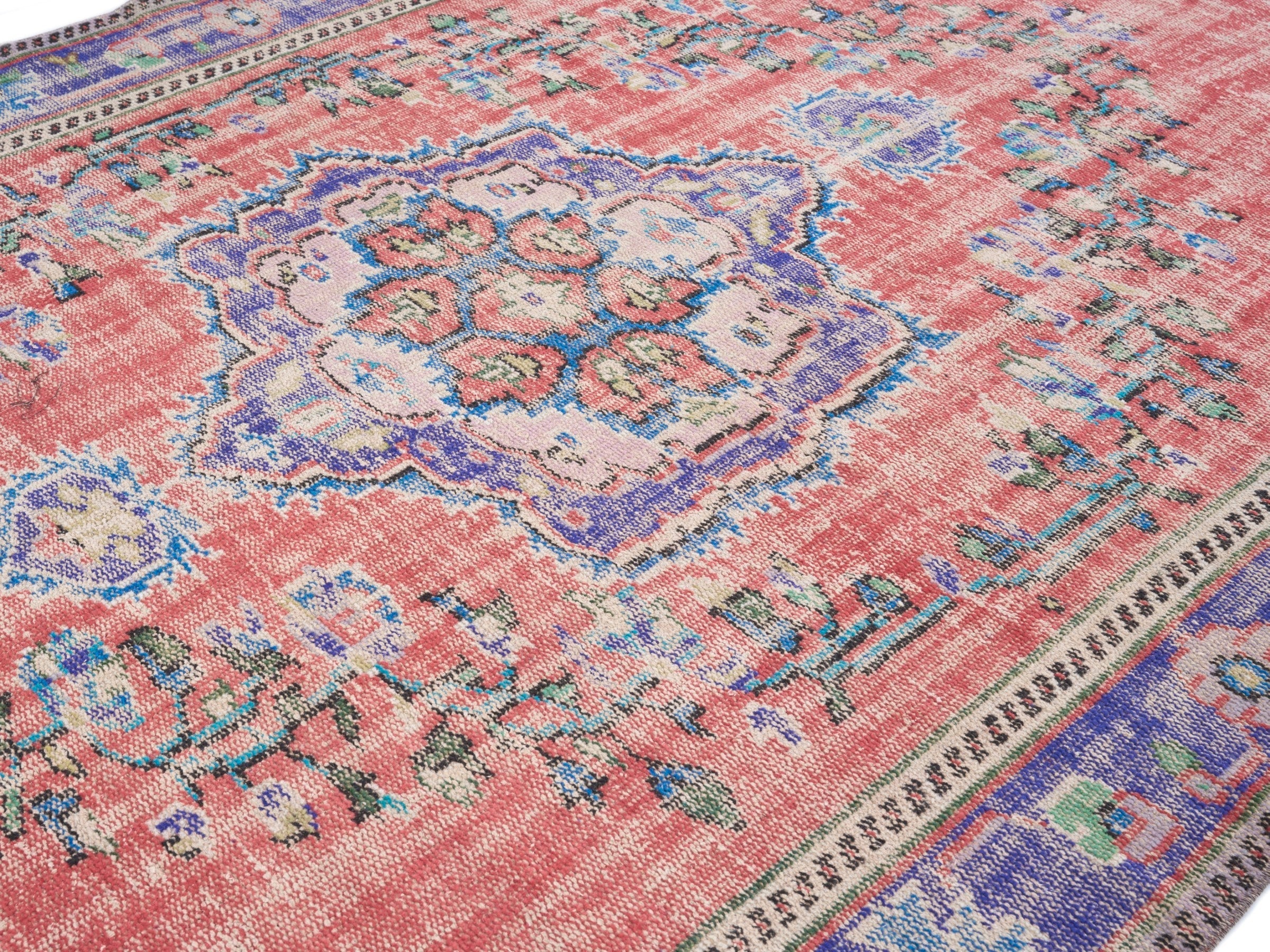 Turkish Manisa area rug in faded red and plum, view 5 of 10