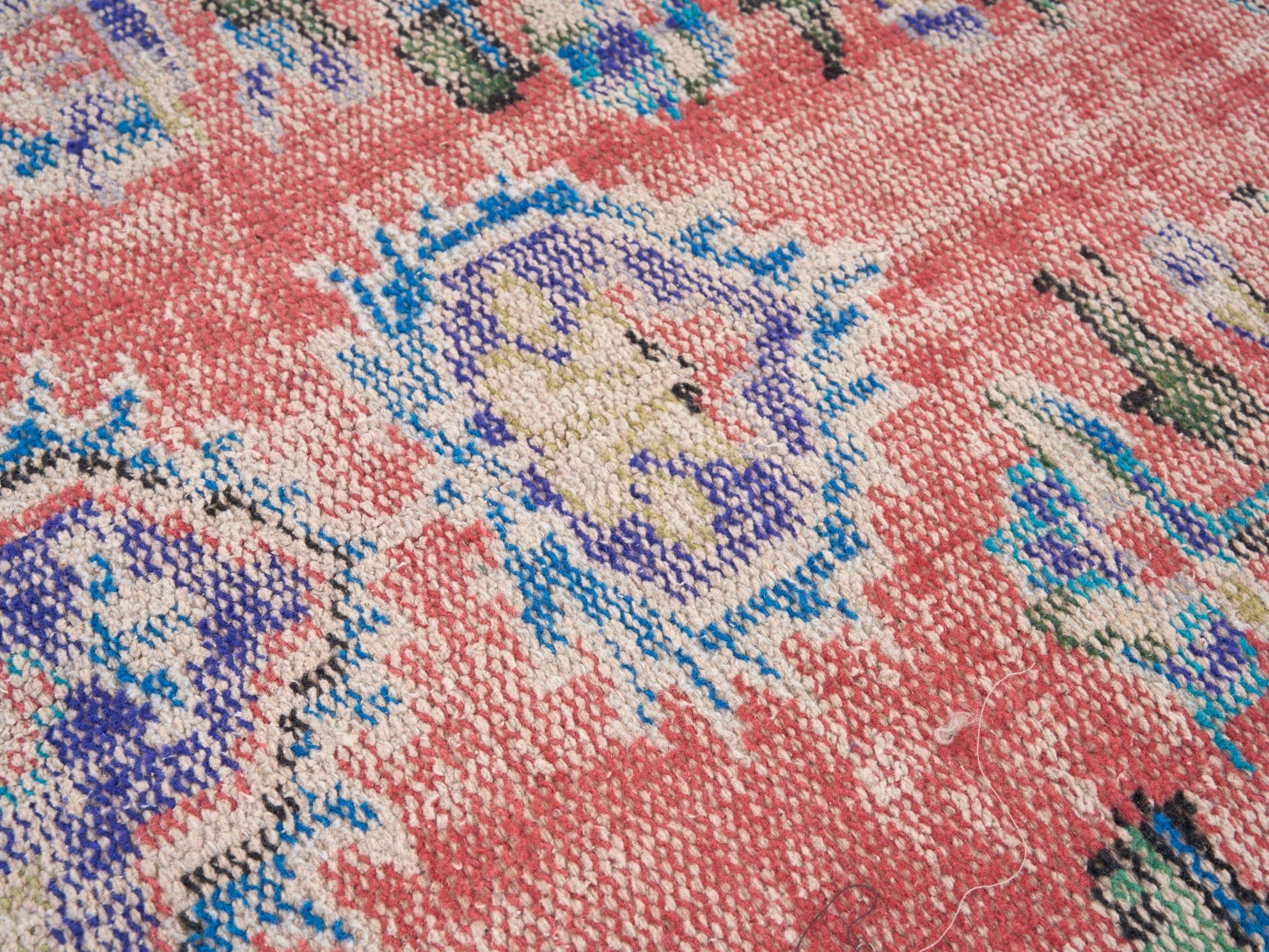 Turkish Manisa area rug in faded red and plum, view 7 of 10
