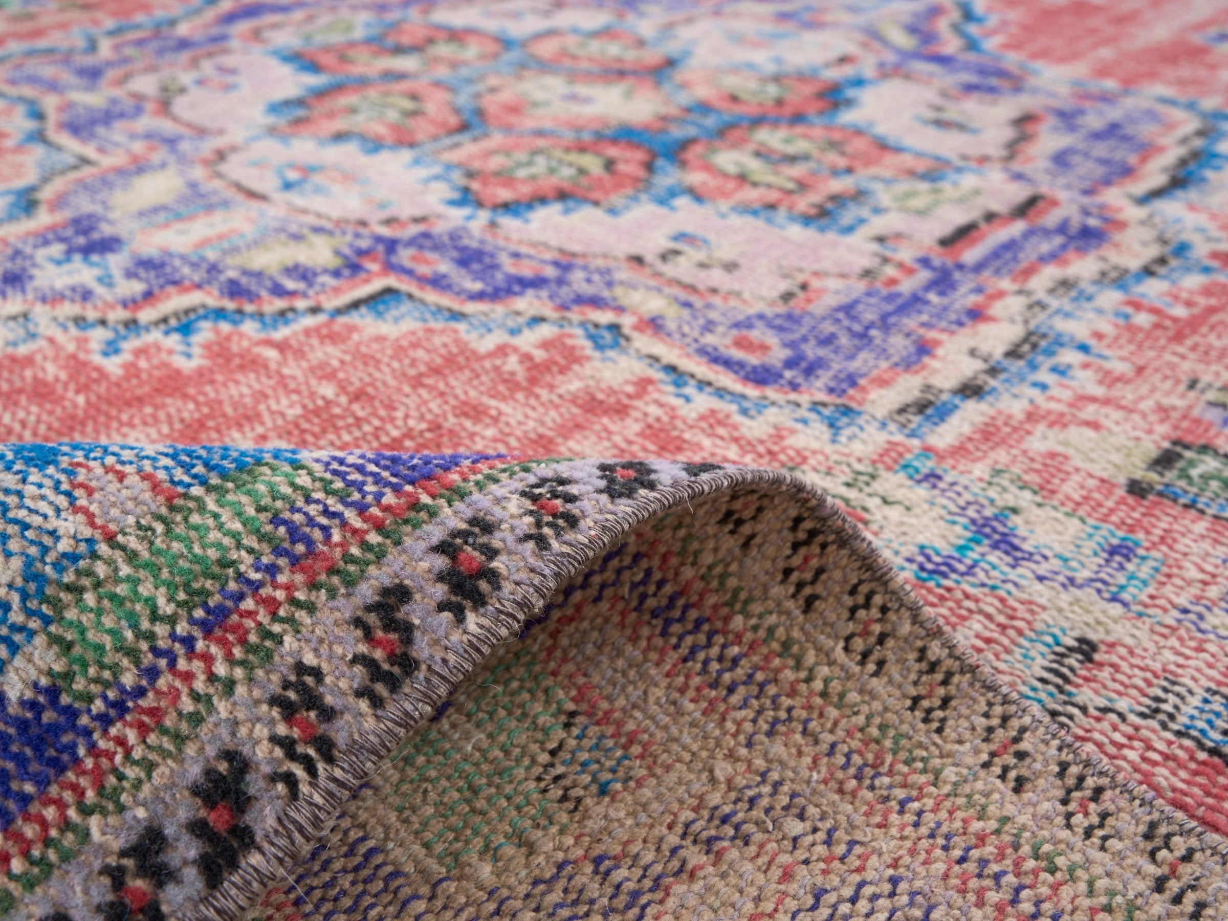 Turkish Manisa area rug in faded red and plum, view 9 of 10