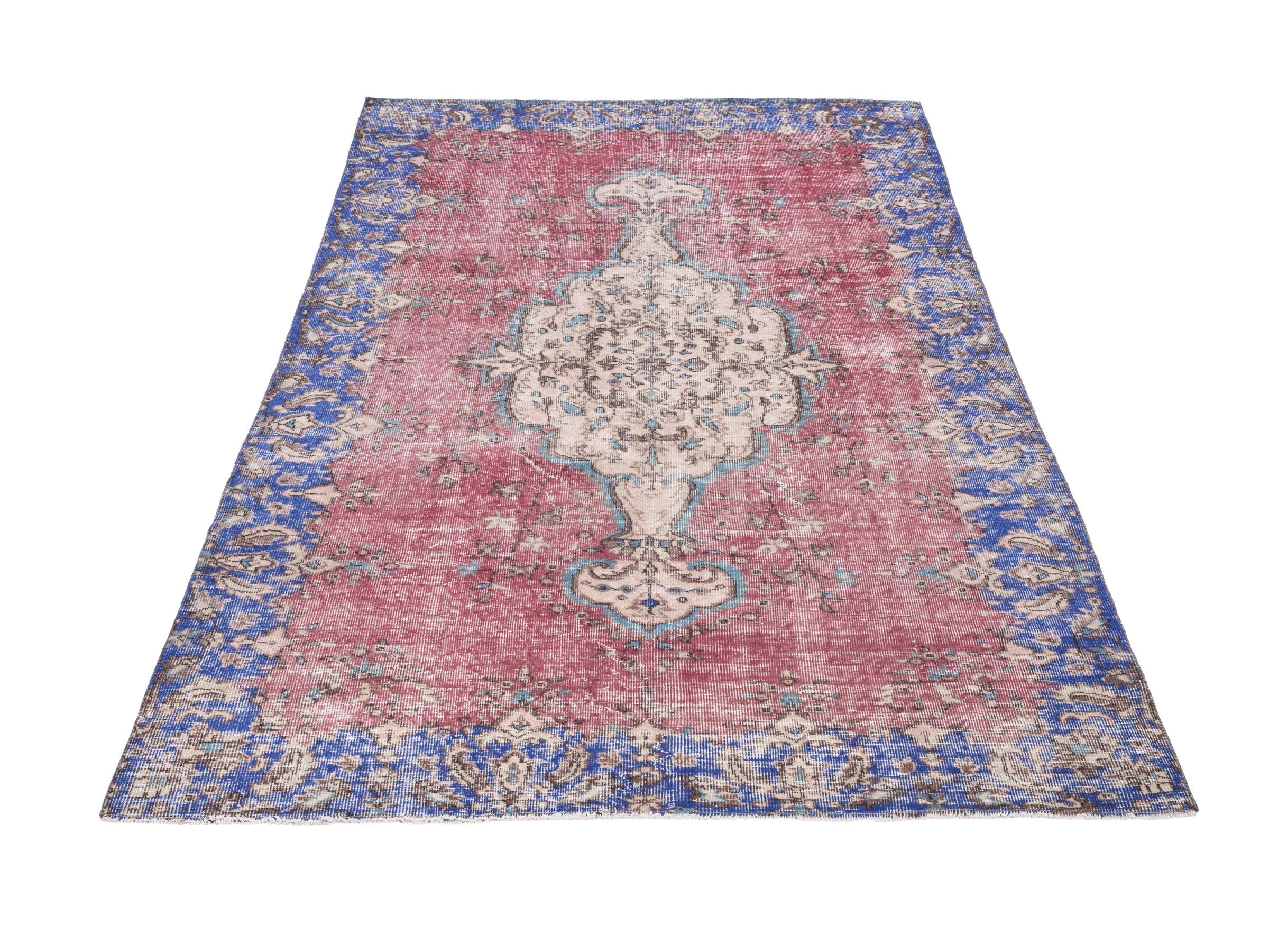 Turkish Isparta area rug in dusty rose and dark blue, view 2 of 10