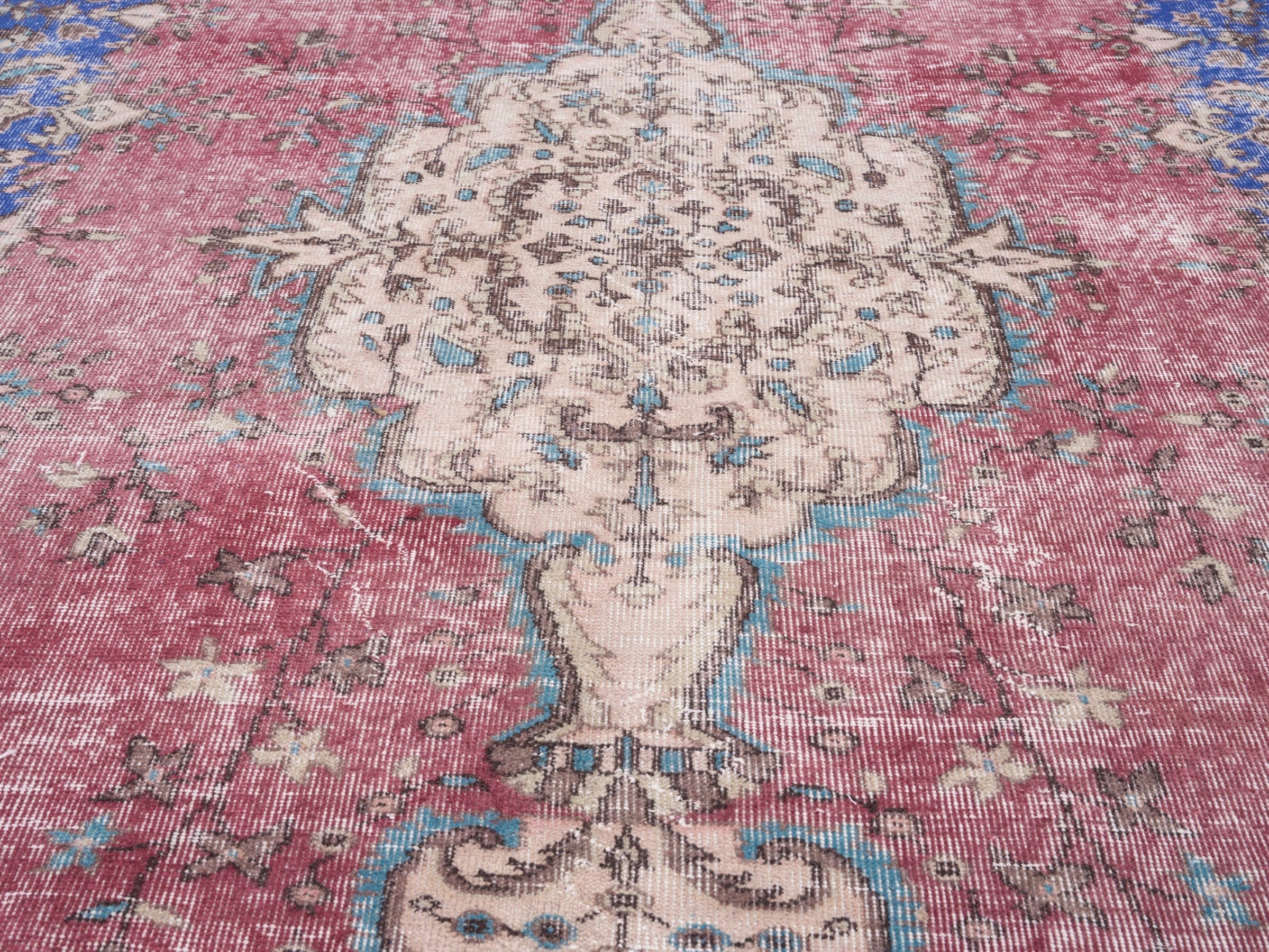Turkish Isparta area rug in dusty rose and dark blue, view 4 of 10