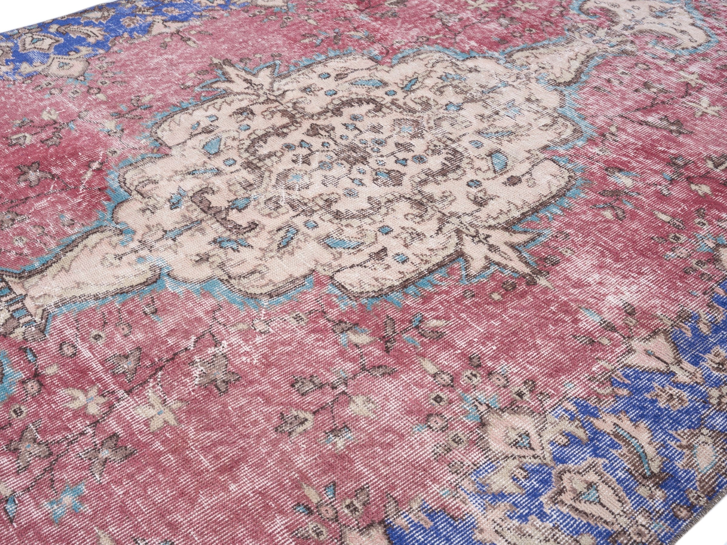 Turkish Isparta area rug in dusty rose and dark blue, view 5 of 10