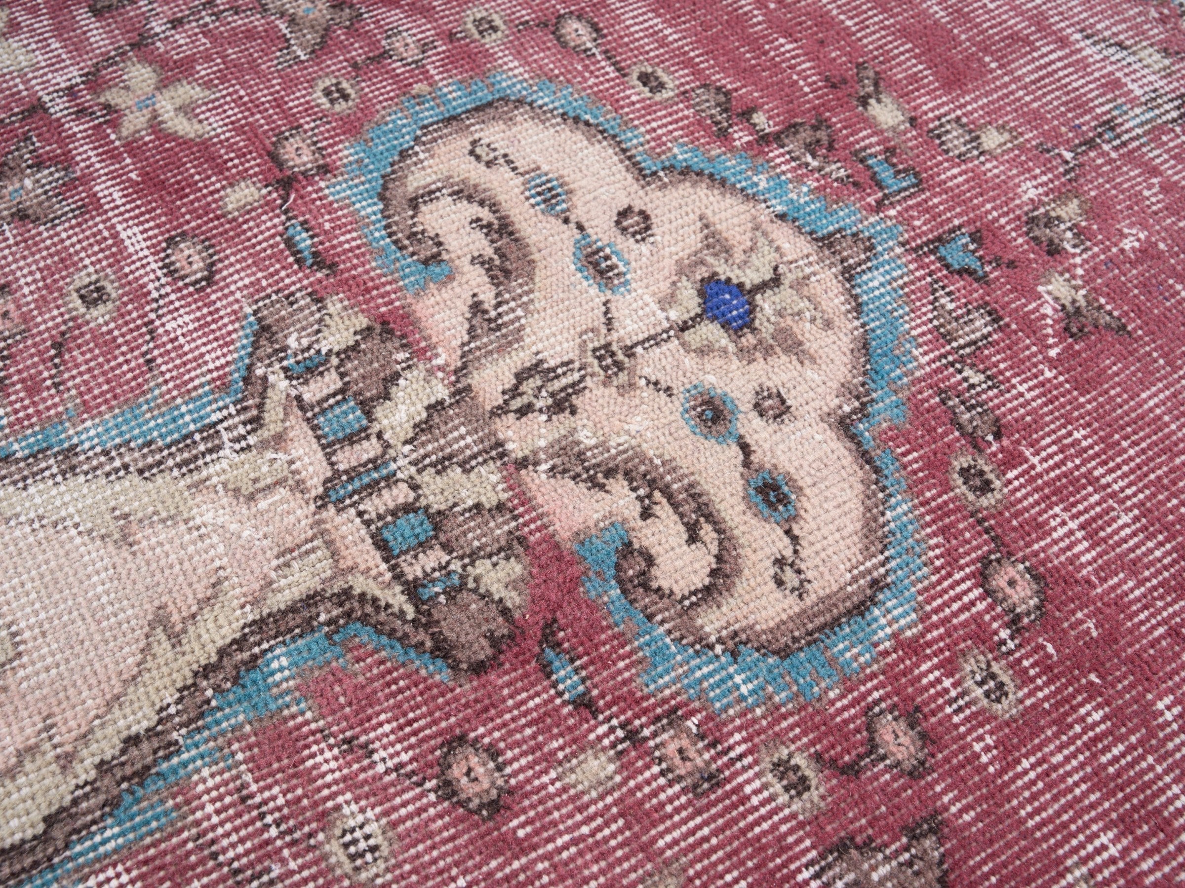 Turkish Isparta area rug in dusty rose and dark blue, view 7 of 10