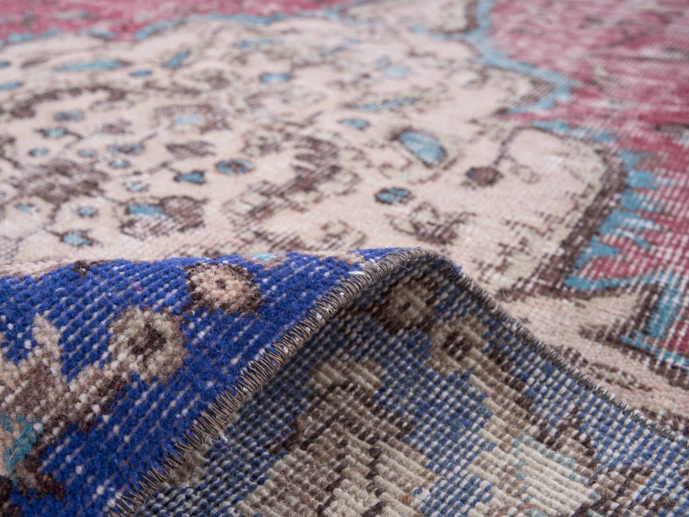 Turkish Isparta area rug in dusty rose and dark blue, view 9 of 10