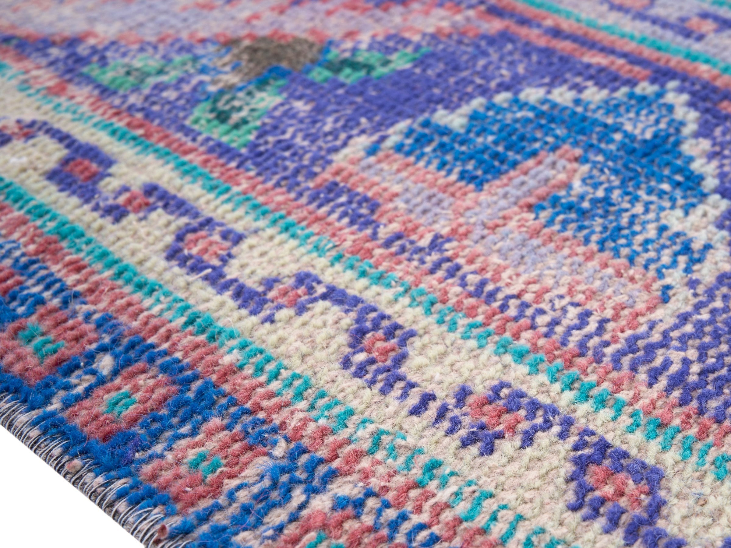 Turkish Manisa area rug in dusty rose and plum, view 6 of 10