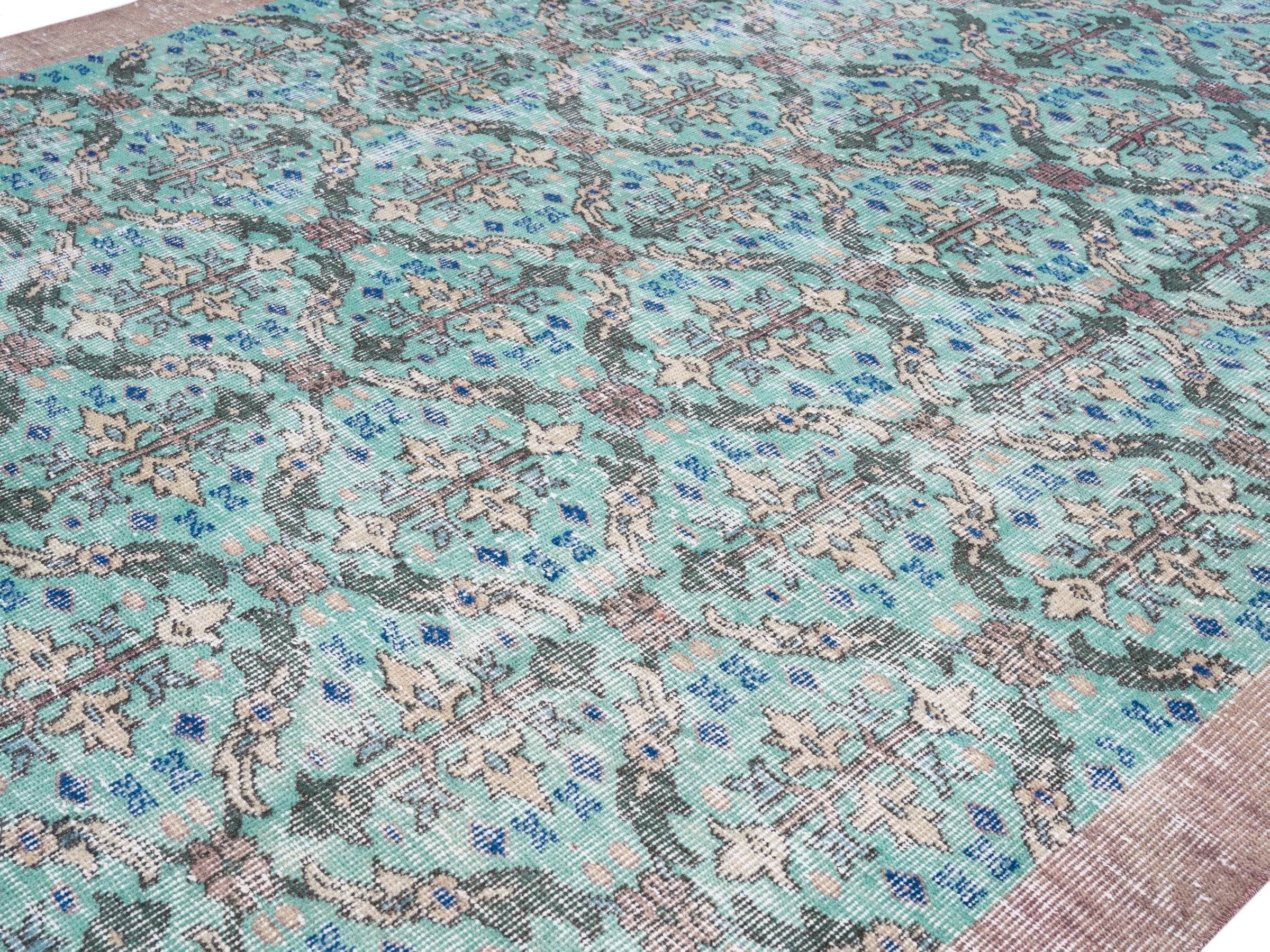 Turkish Isparta area rug in turquoise and muted pink, view 5 of 10