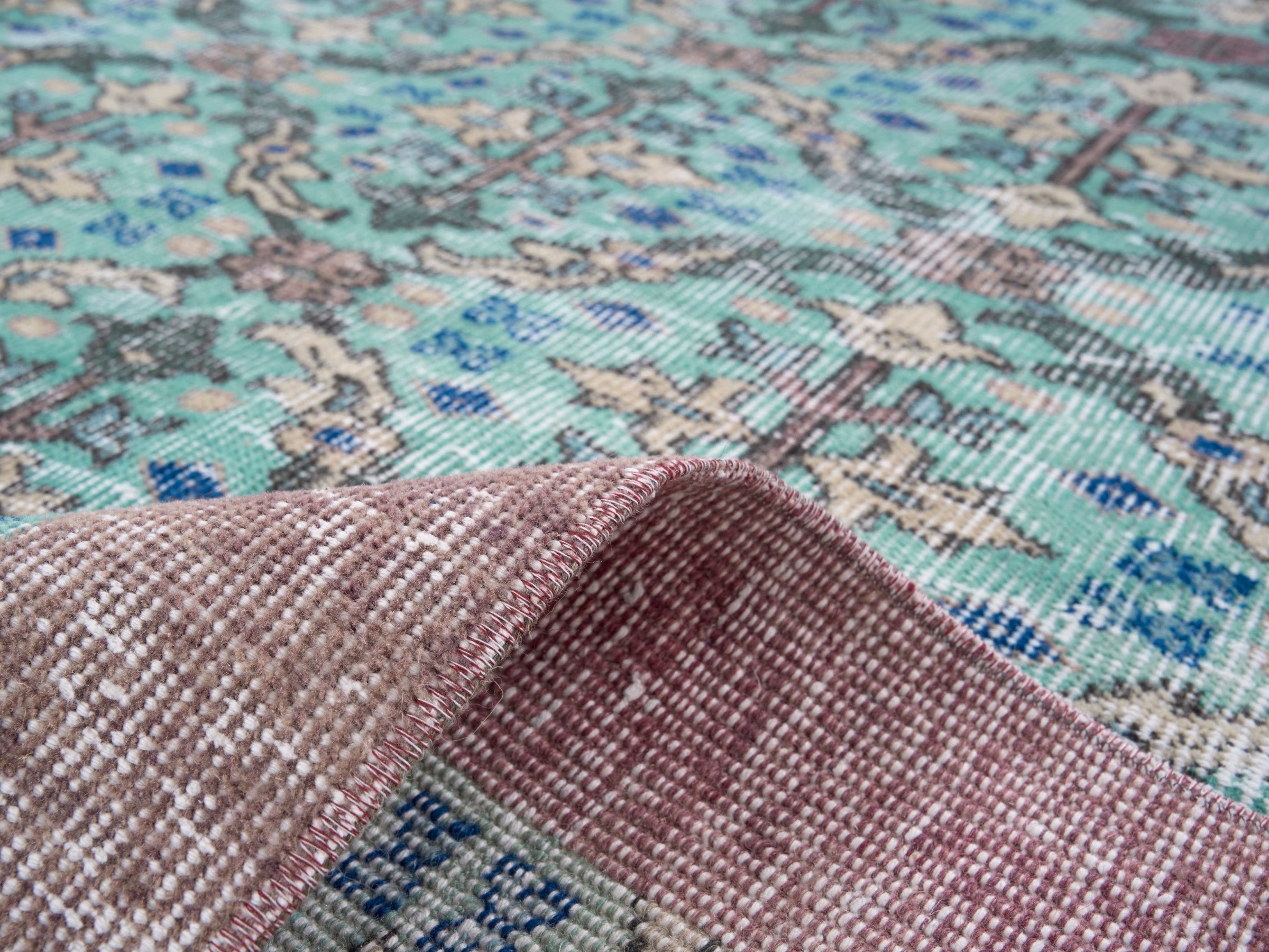 Turkish Isparta area rug in turquoise and muted pink, view 9 of 10