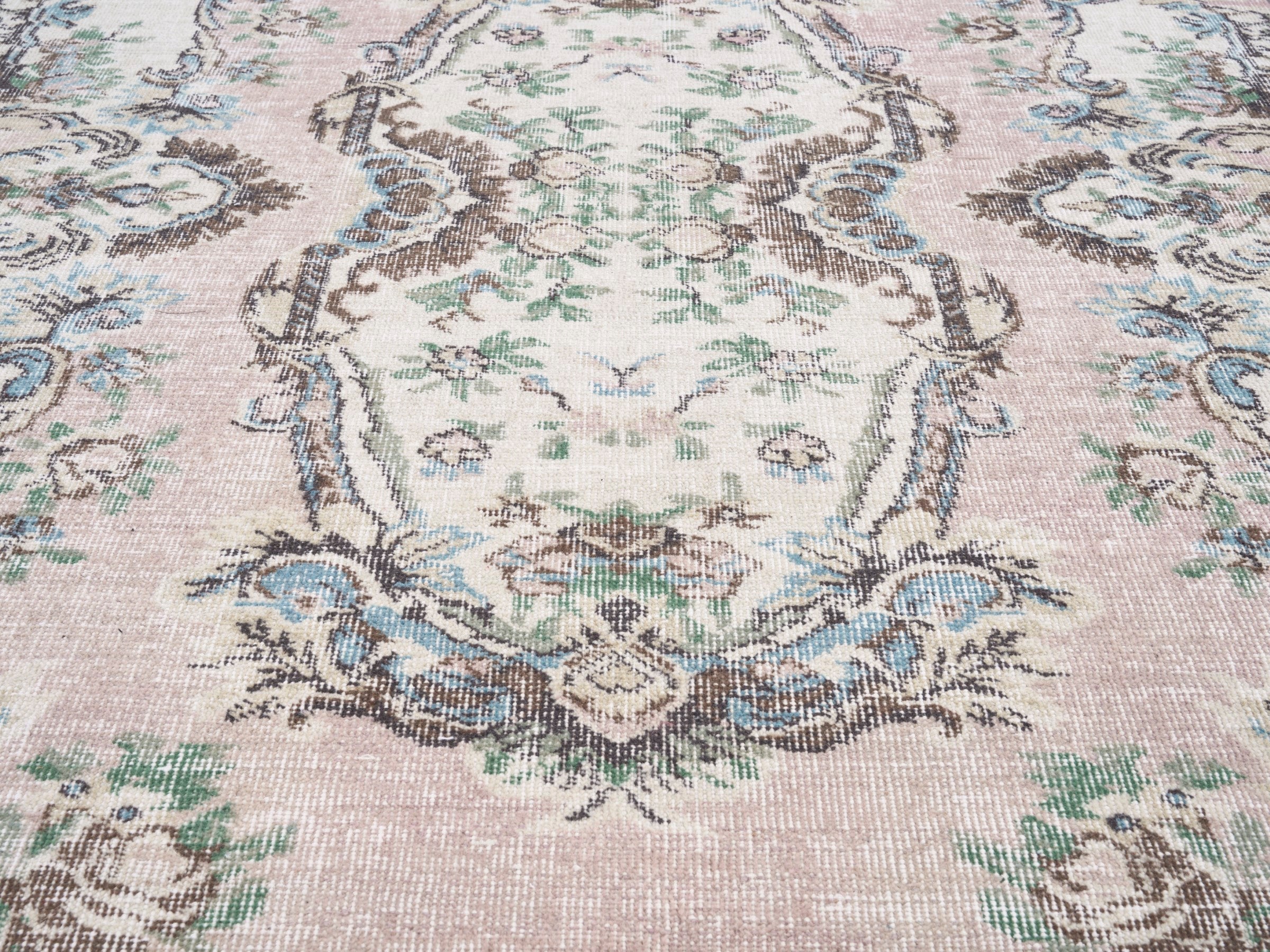 Turkish Isparta area rug in muted pink and cream, view 4 of 10