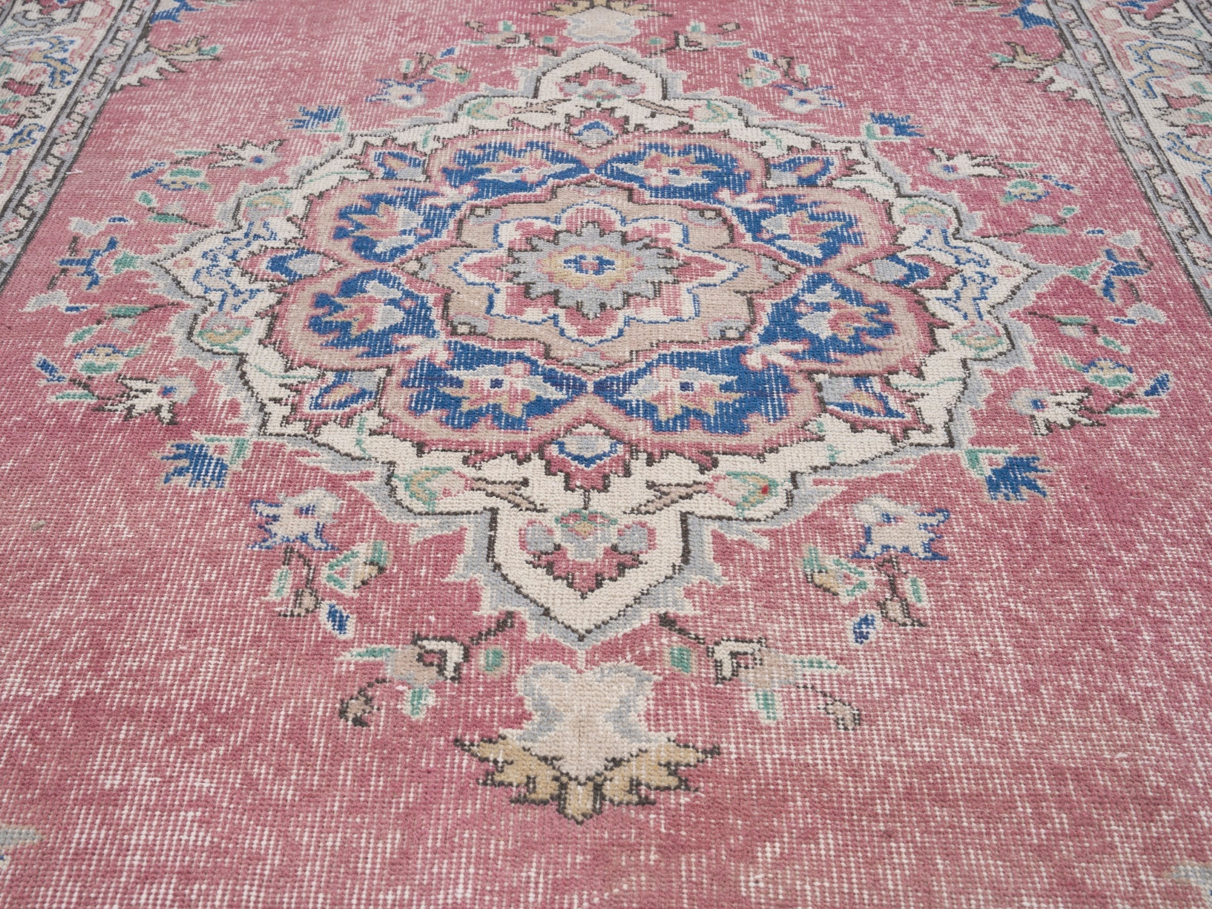 Turkish Isparta area rug in muted pink and off-white, view 4 of 10