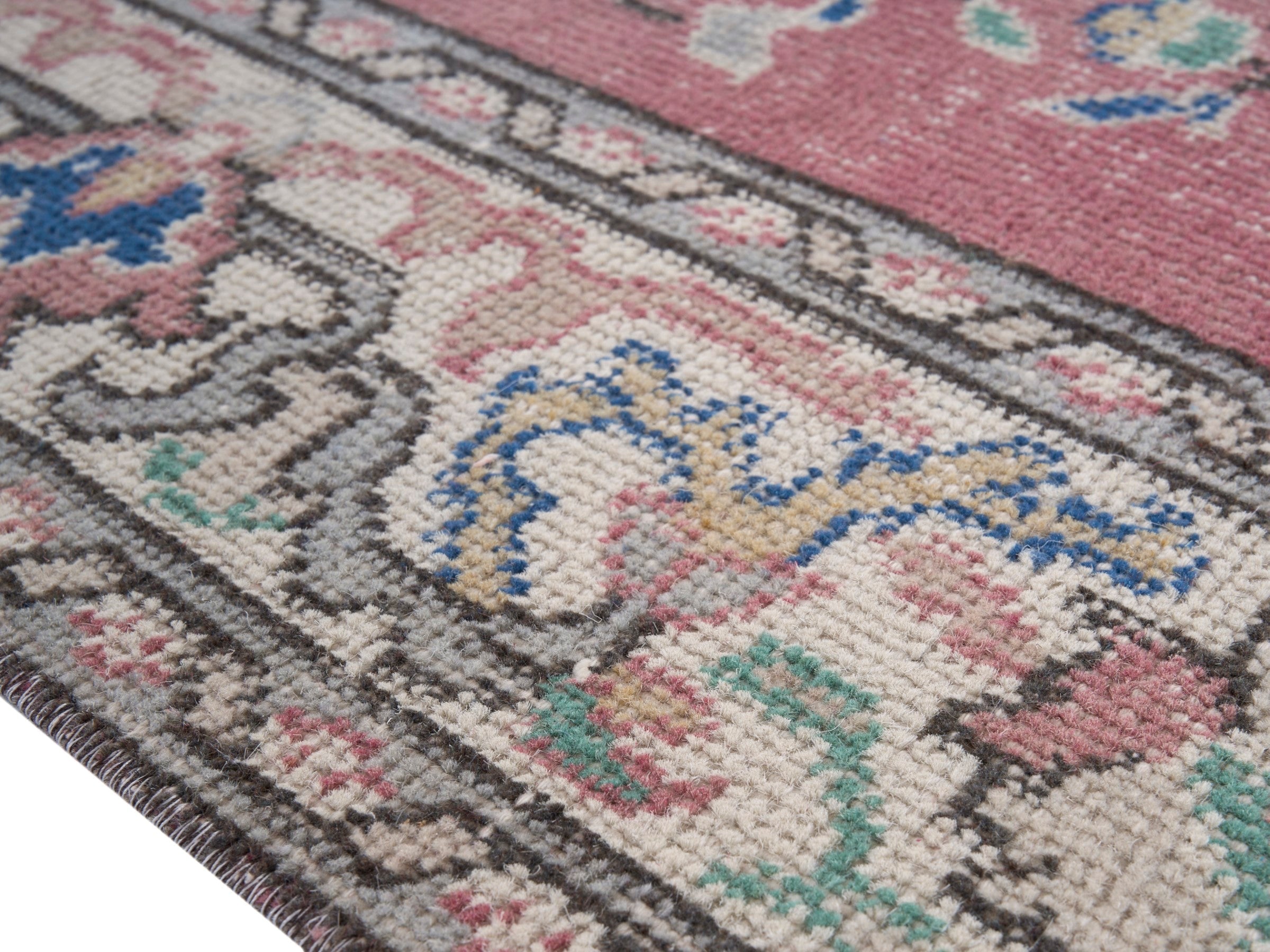 Turkish Isparta area rug in muted pink and off-white, view 6 of 10