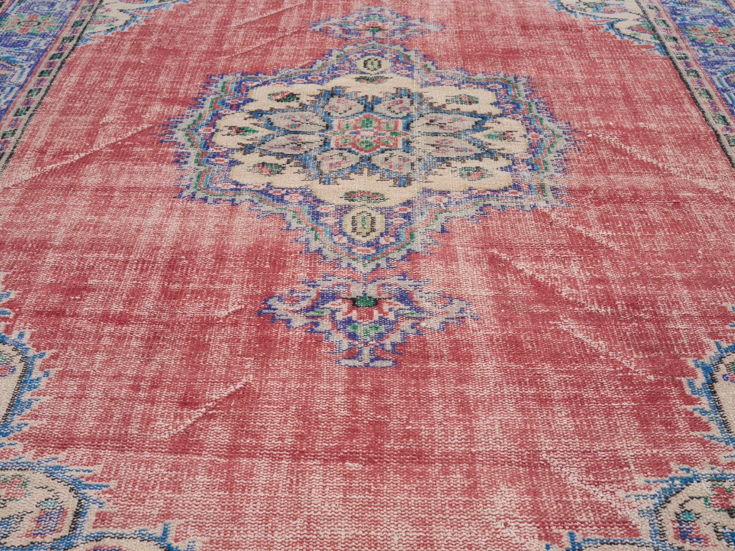 Turkish Manisa area rug in faded red and navy, view 4 of 10