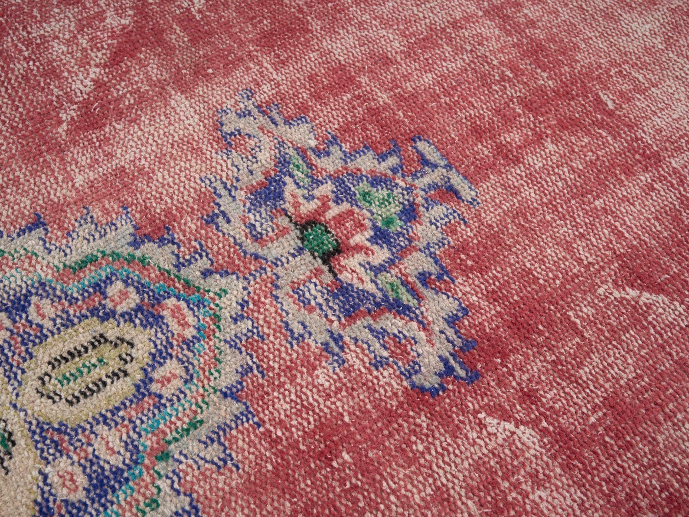 Turkish Manisa area rug in faded red and navy, view 7 of 10