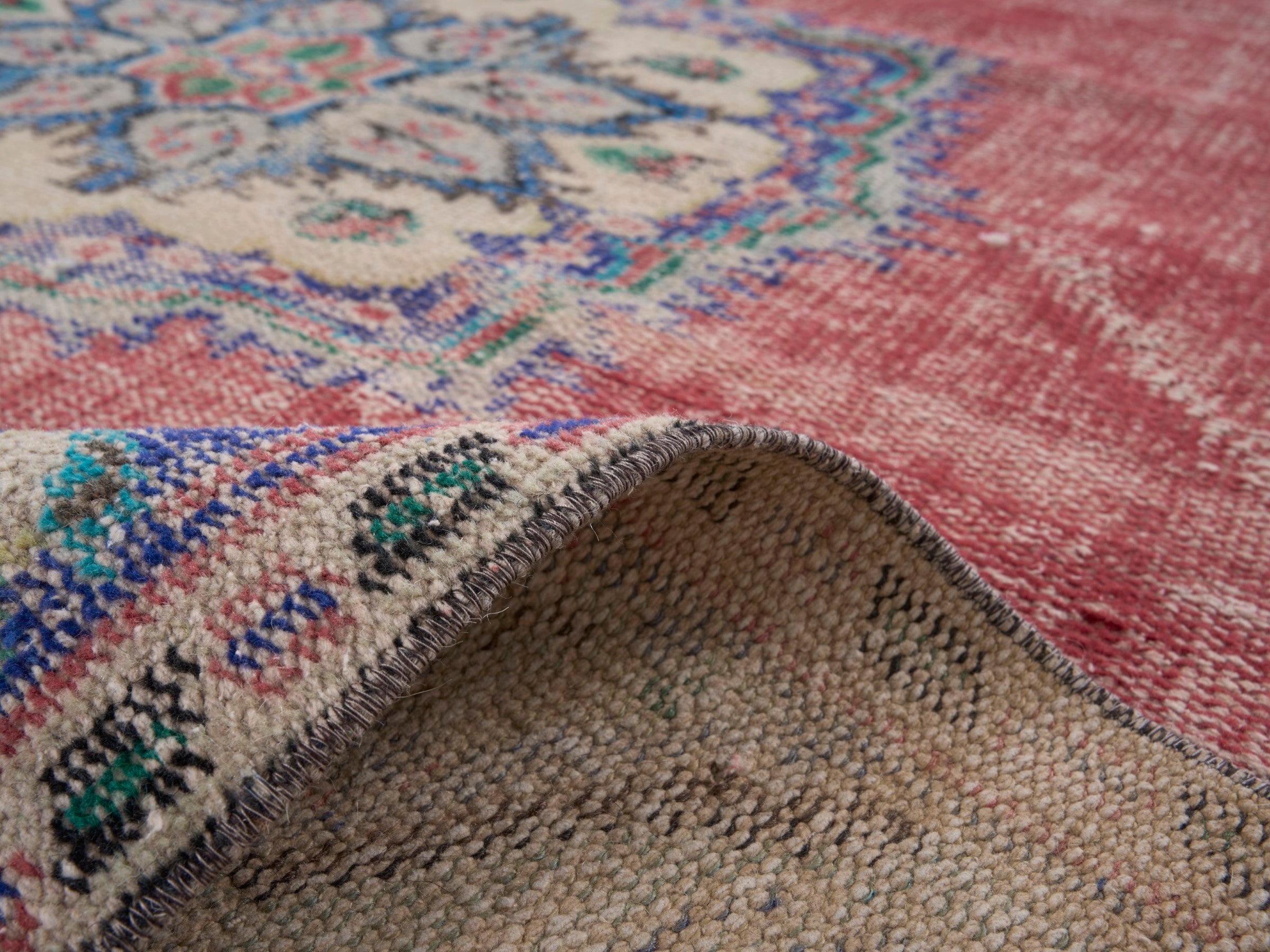 Turkish Manisa area rug in faded red and navy, view 9 of 10