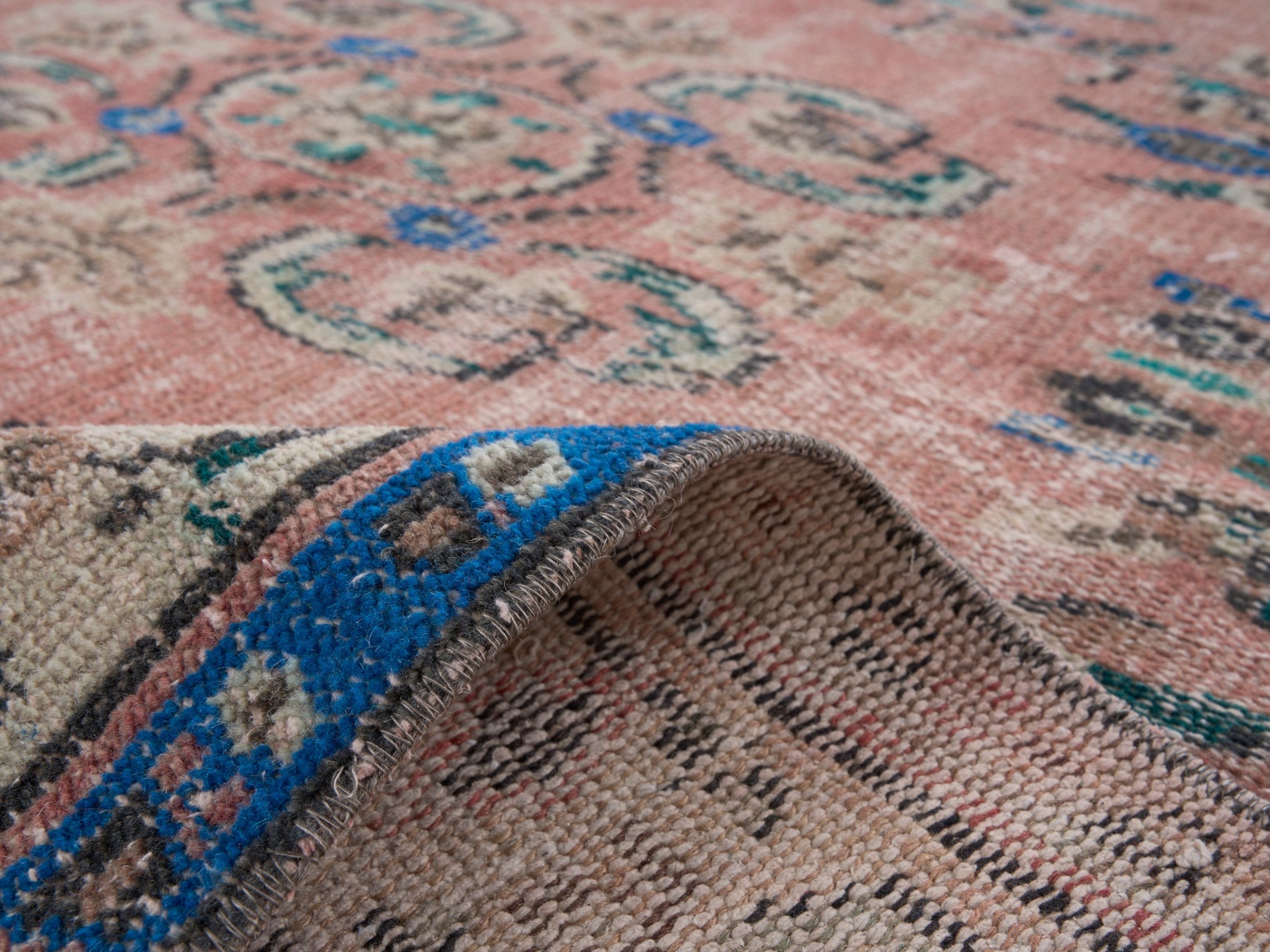 Turkish Manisa area rug in muted pink and cream, view 9 of 10