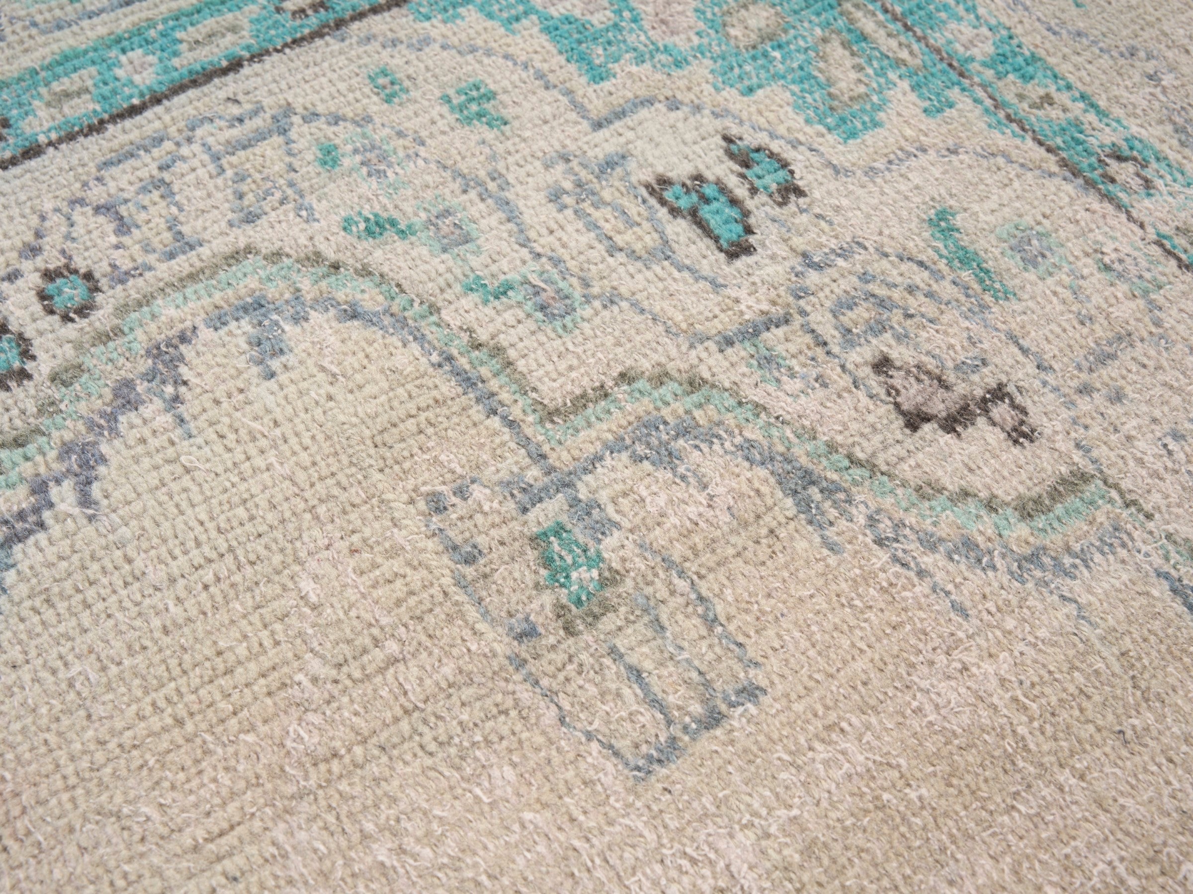 Turkish Manisa area rug in cream and teal, view 7 of 10