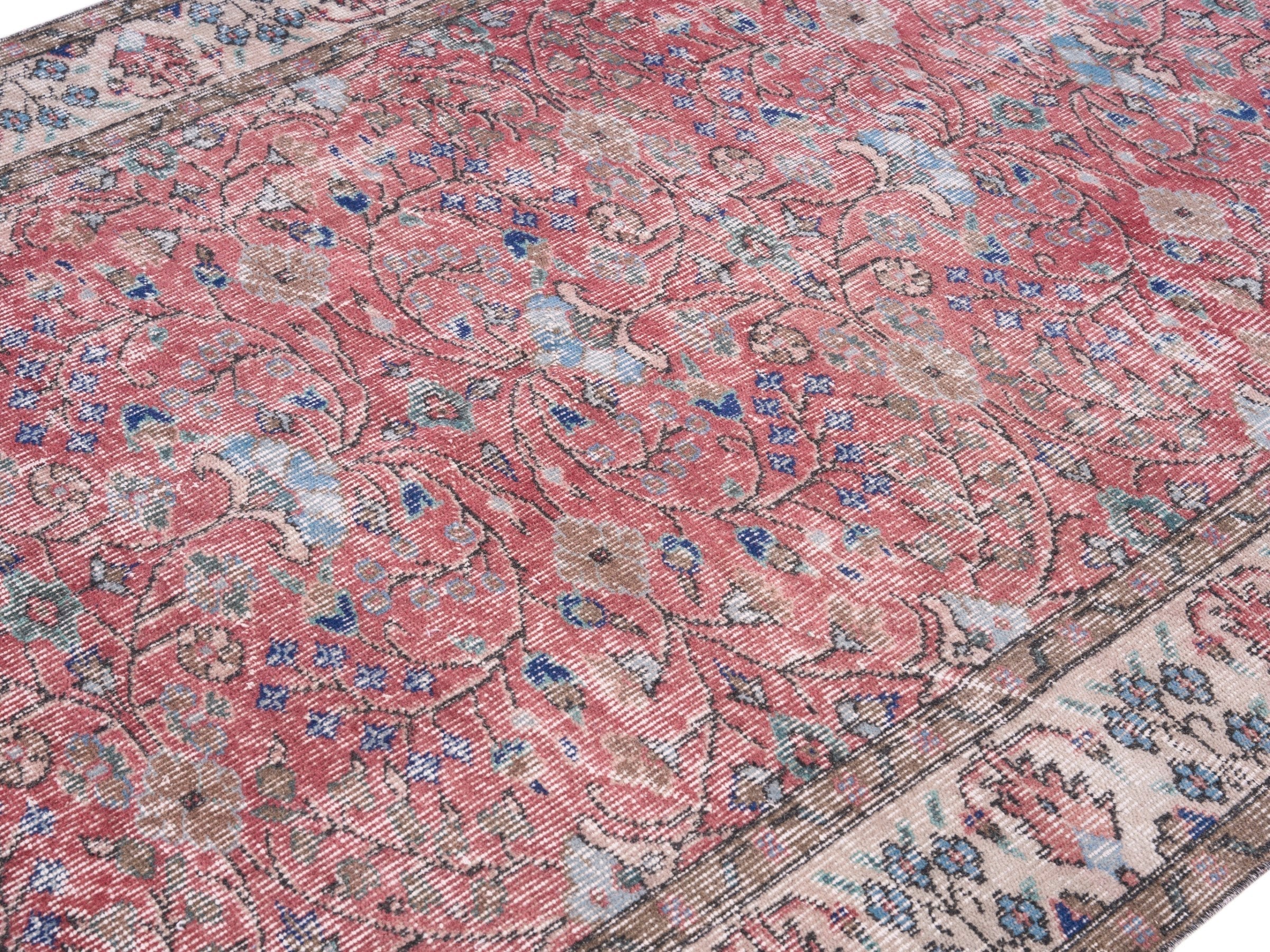 Turkish Isparta area rug in faded red and muted pink, view 5 of 10