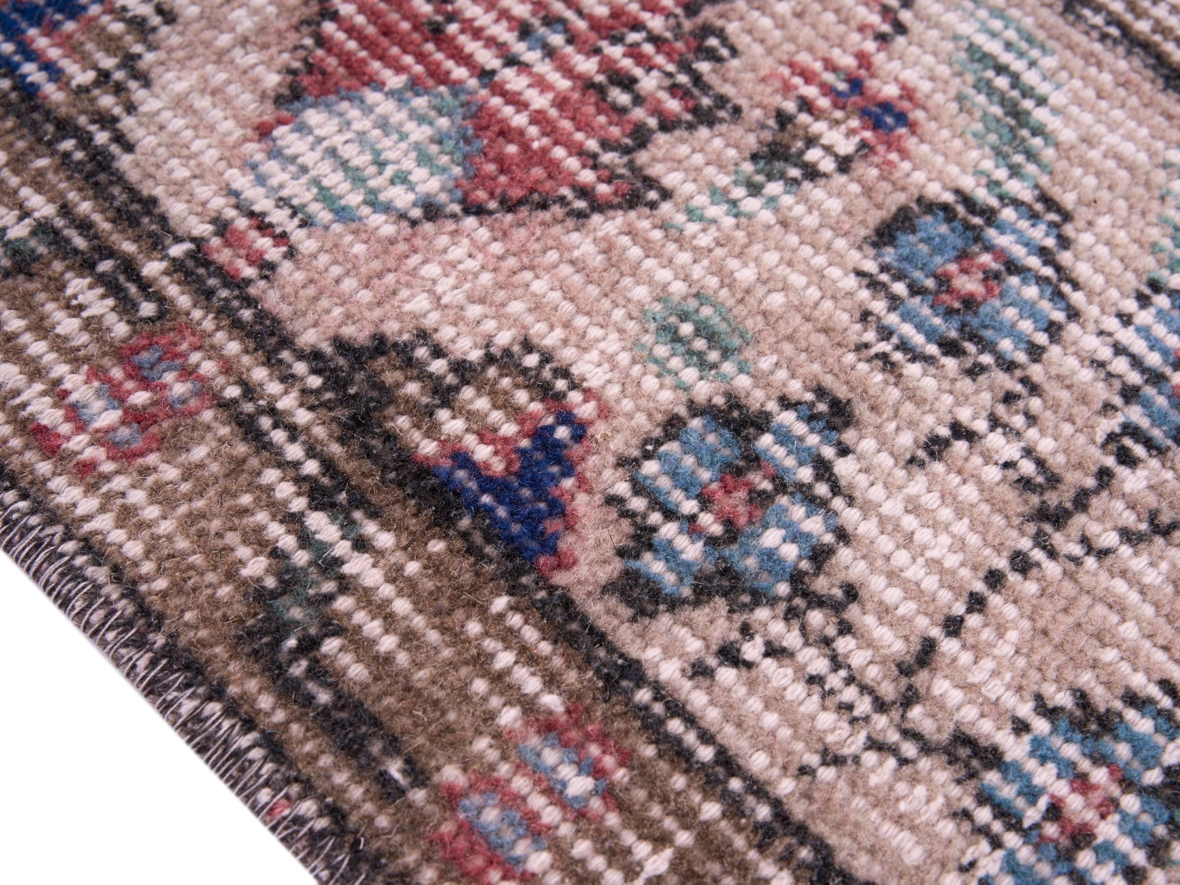 Turkish Isparta area rug in faded red and muted pink, view 6 of 10