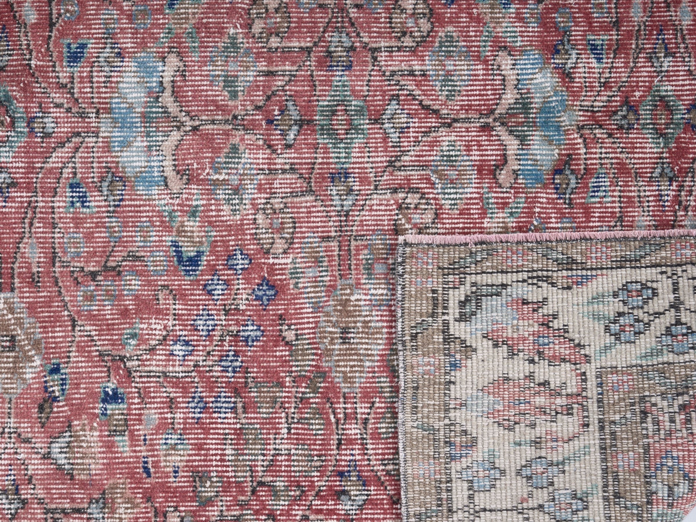 Turkish Isparta area rug in faded red and muted pink, view 10 of 10