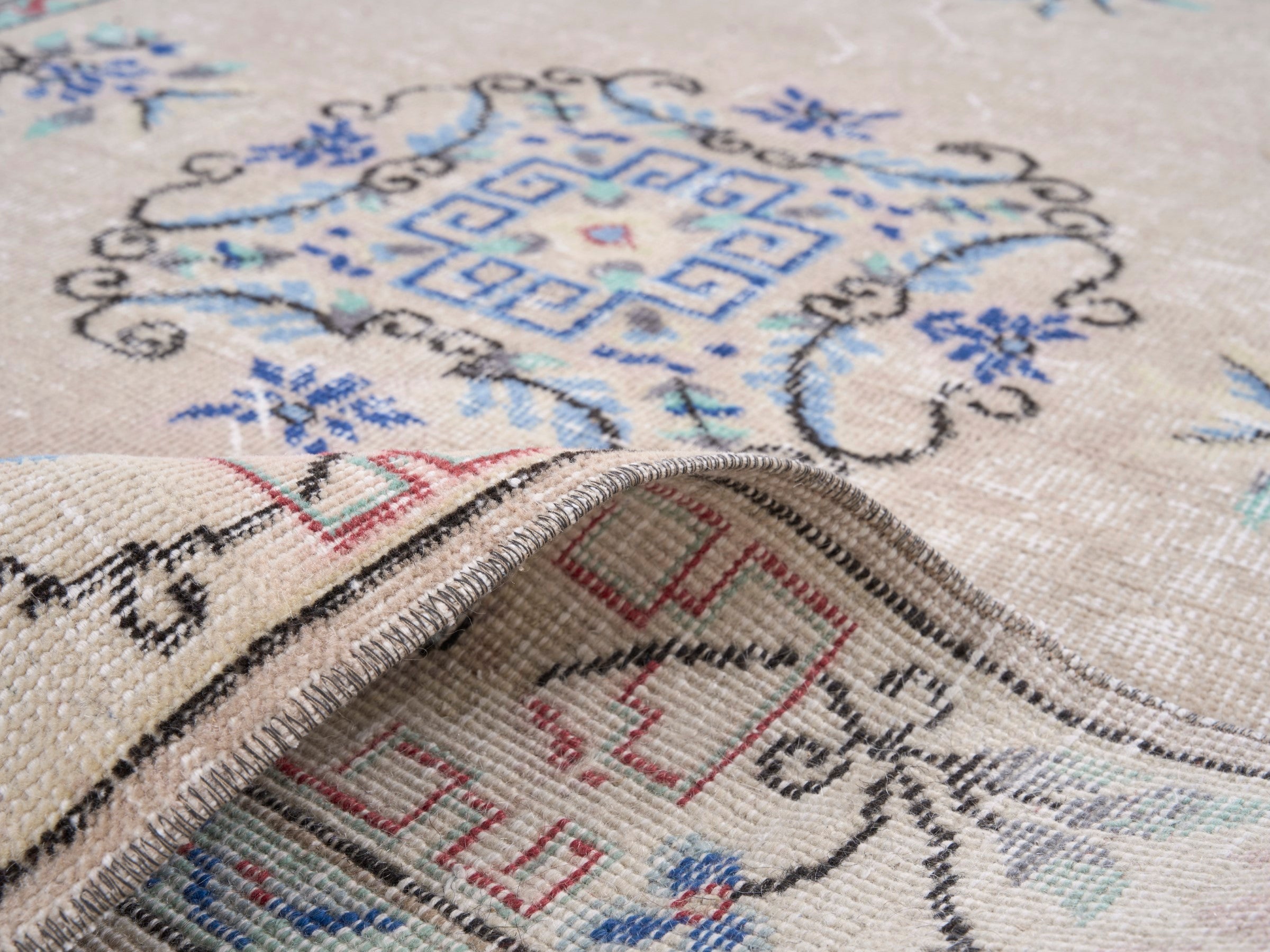 Turkish Isparta area rug in beige and muted pink, view 9 of 10