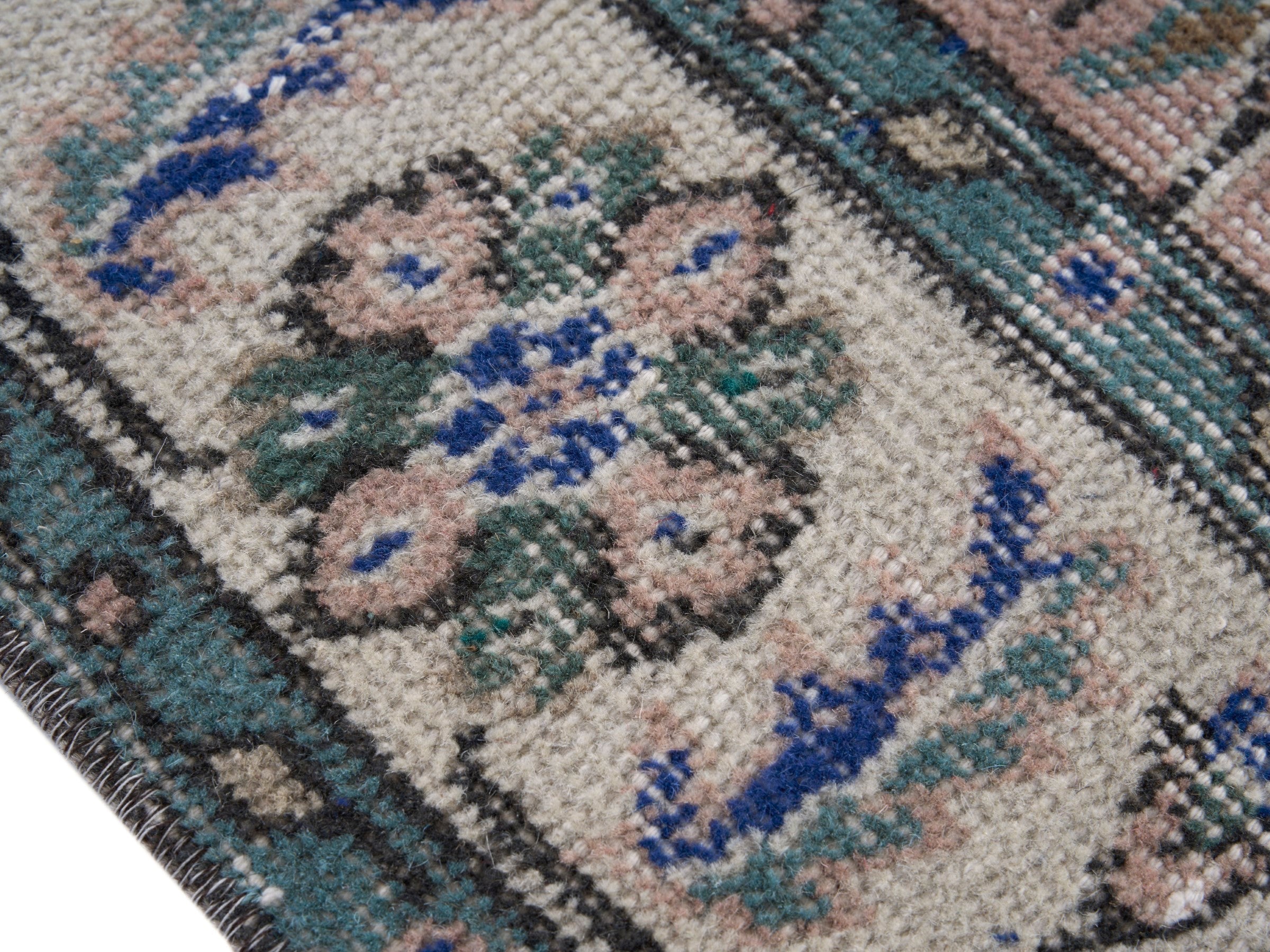 Turkish Isparta area rug in muted pink and cream, view 6 of 10