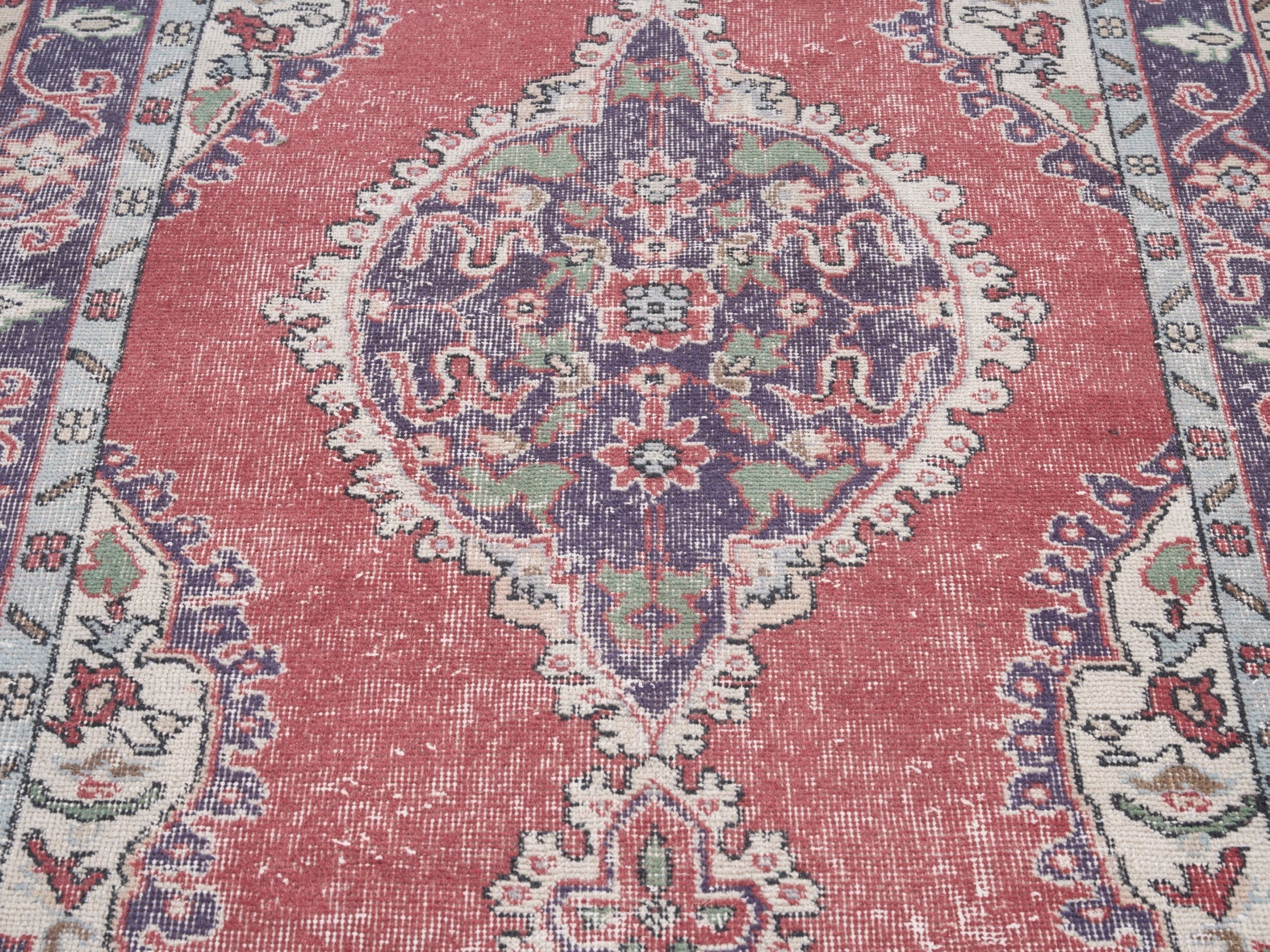Turkish Isparta area rug in faded red and navy, view 4 of 10