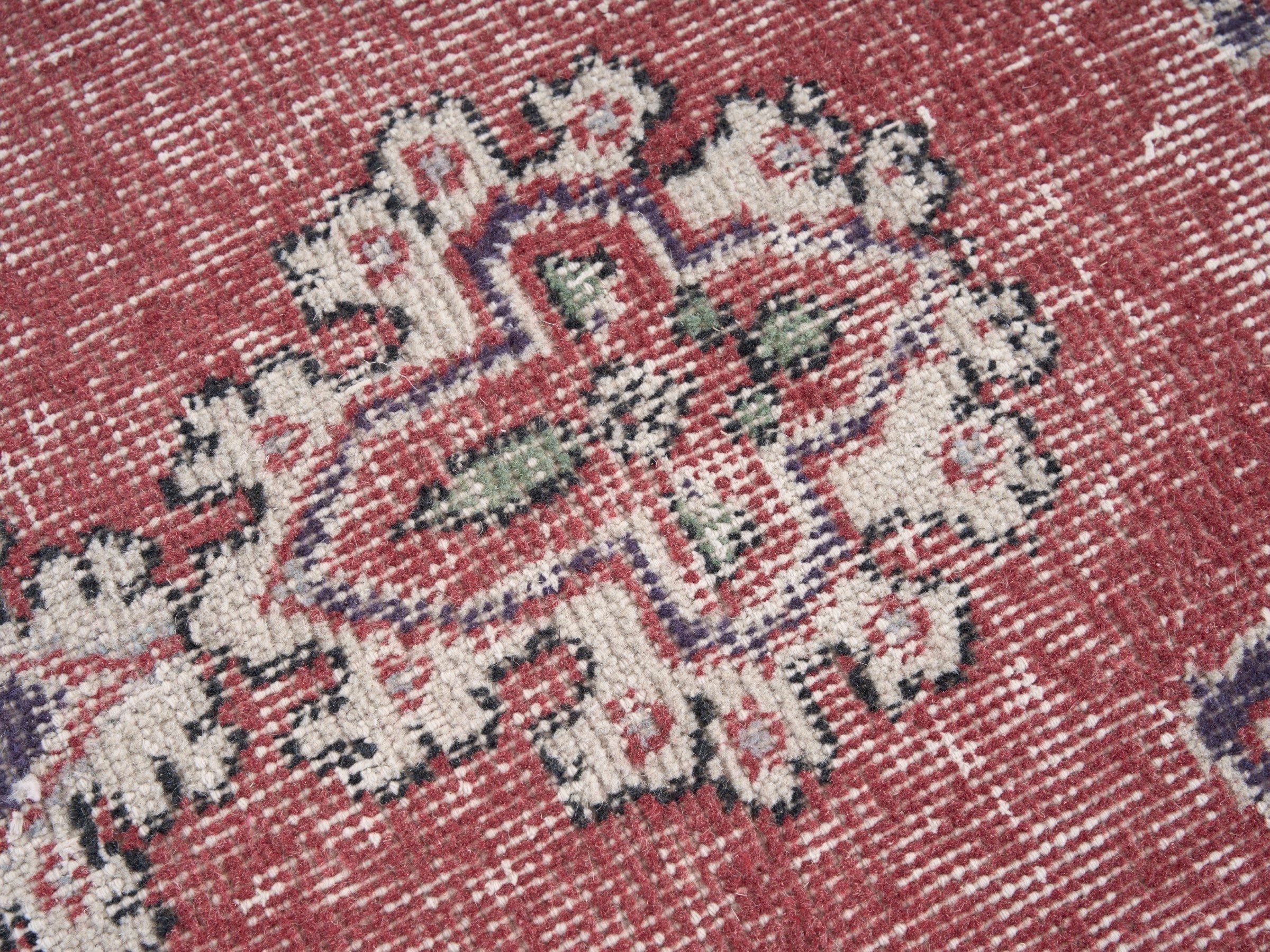 Turkish Isparta area rug in faded red and navy, view 7 of 10