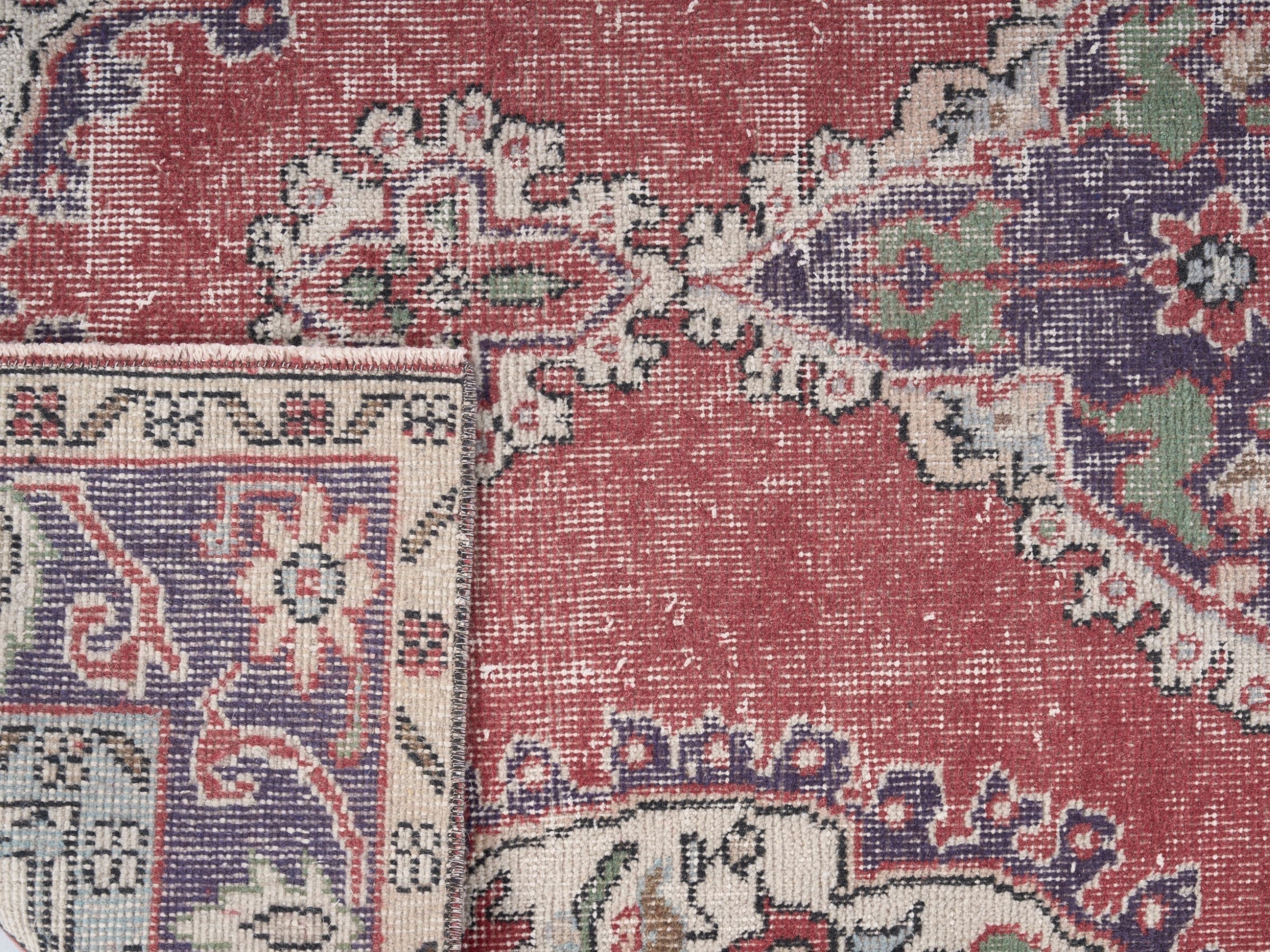 Turkish Isparta area rug in faded red and navy, view 10 of 10