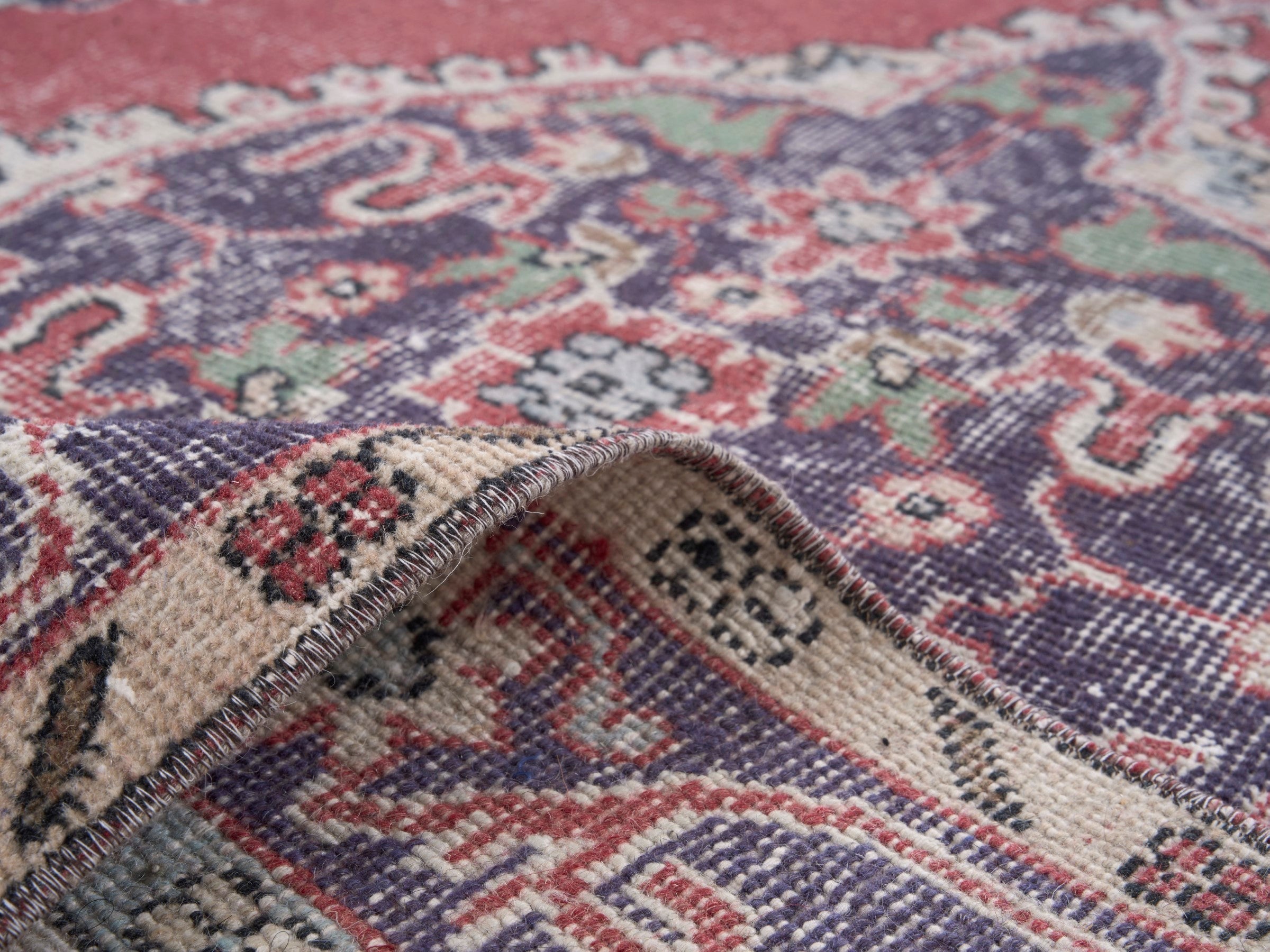 Turkish Isparta area rug in faded red and navy, view 9 of 10