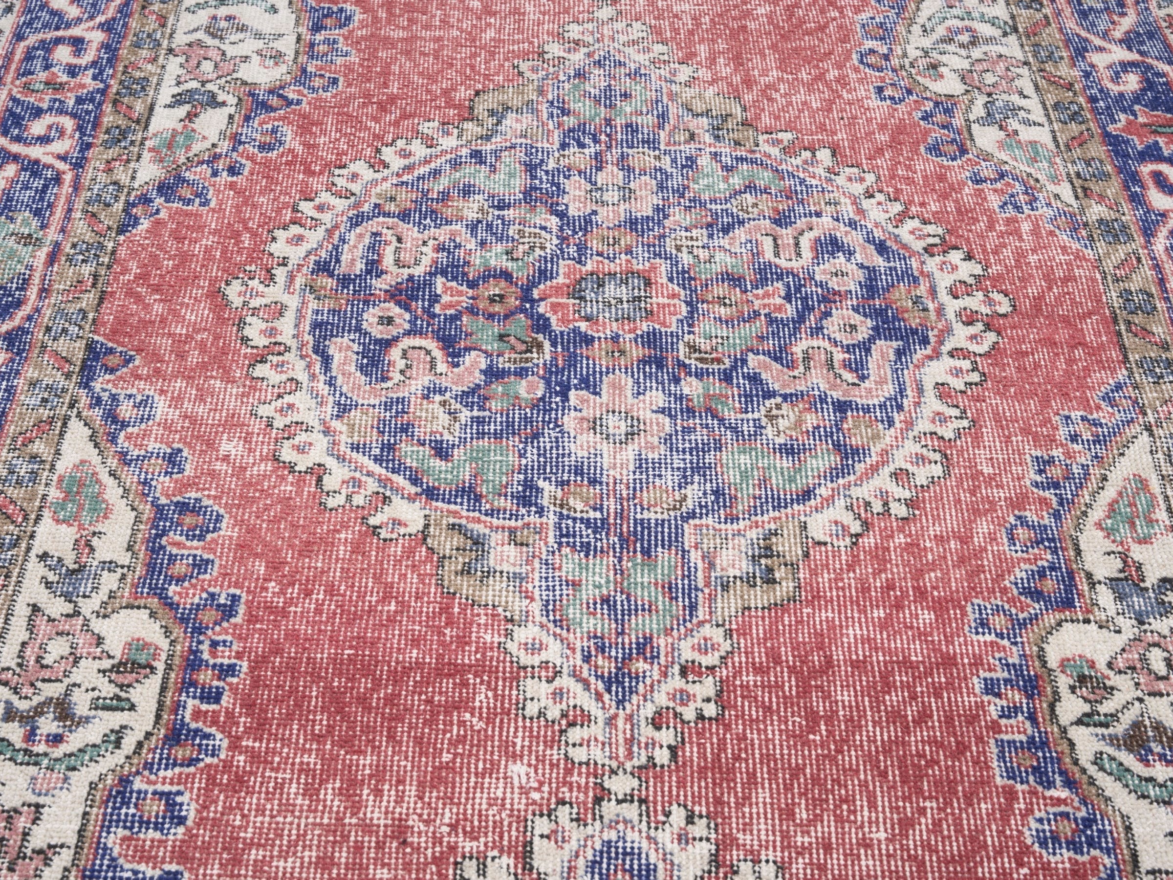 Turkish Isparta area rug in rust and navy, view 4 of 10