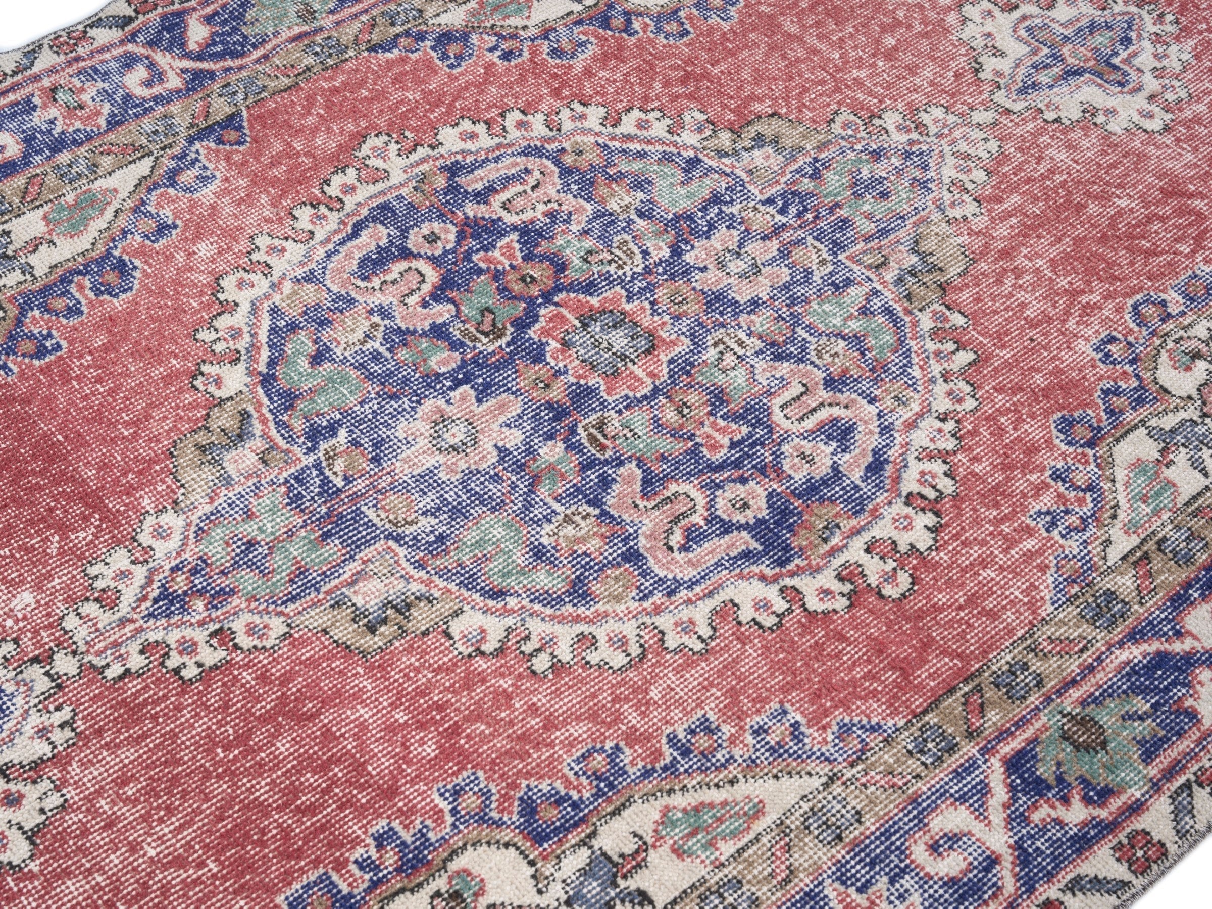 Turkish Isparta area rug in rust and navy, view 5 of 10
