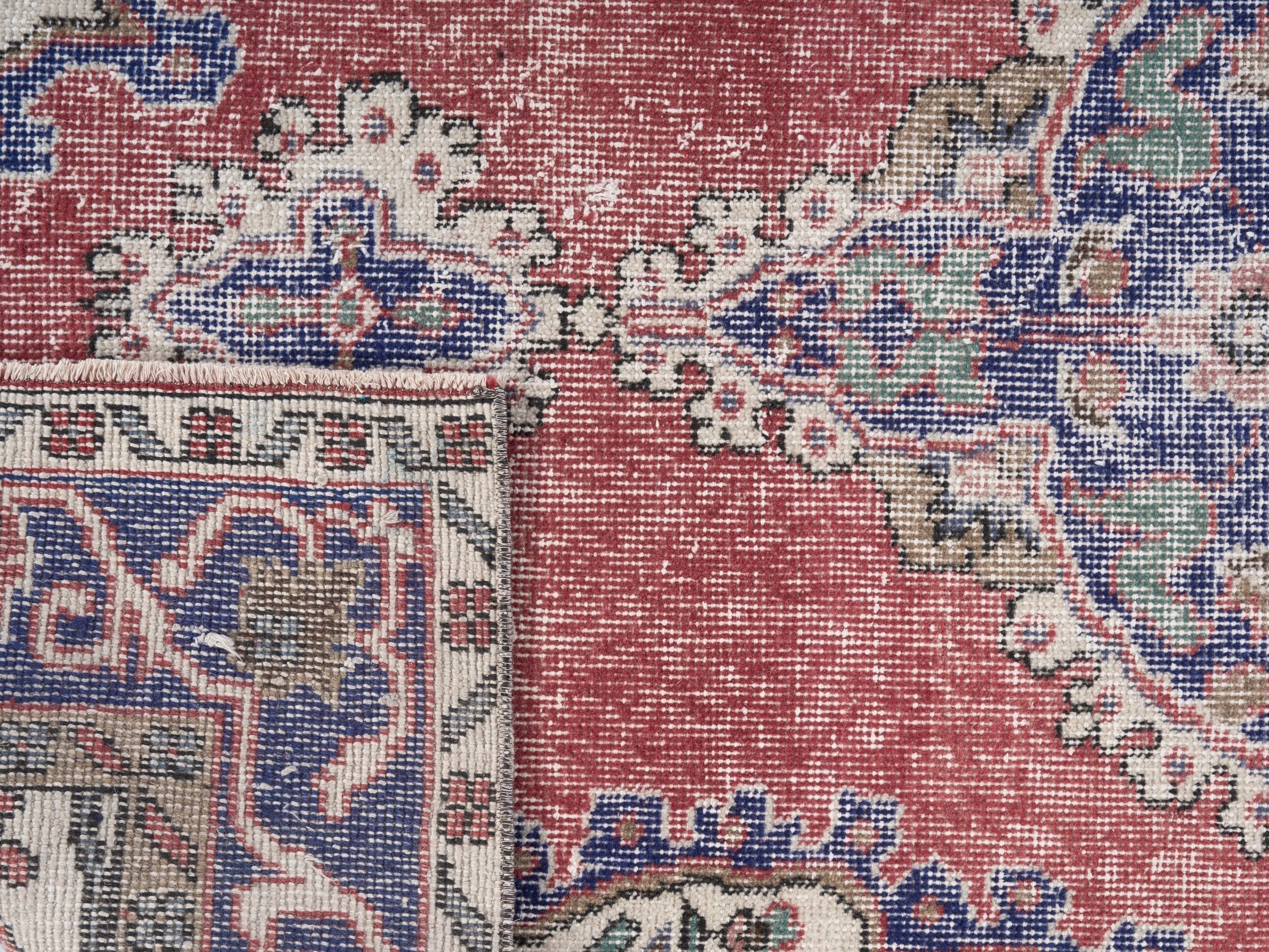 Turkish Isparta area rug in rust and navy, view 10 of 10