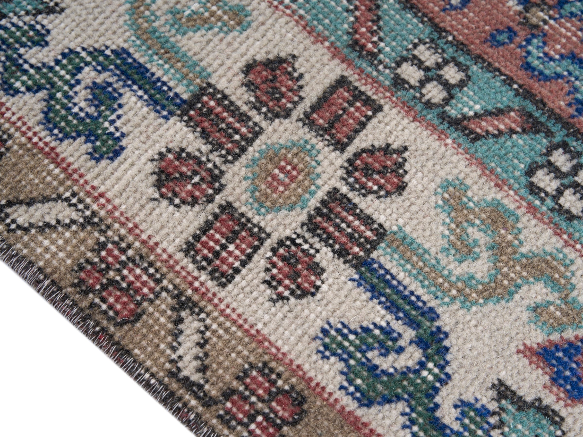 Turkish Isparta area rug in dusty rose and cream, view 6 of 10