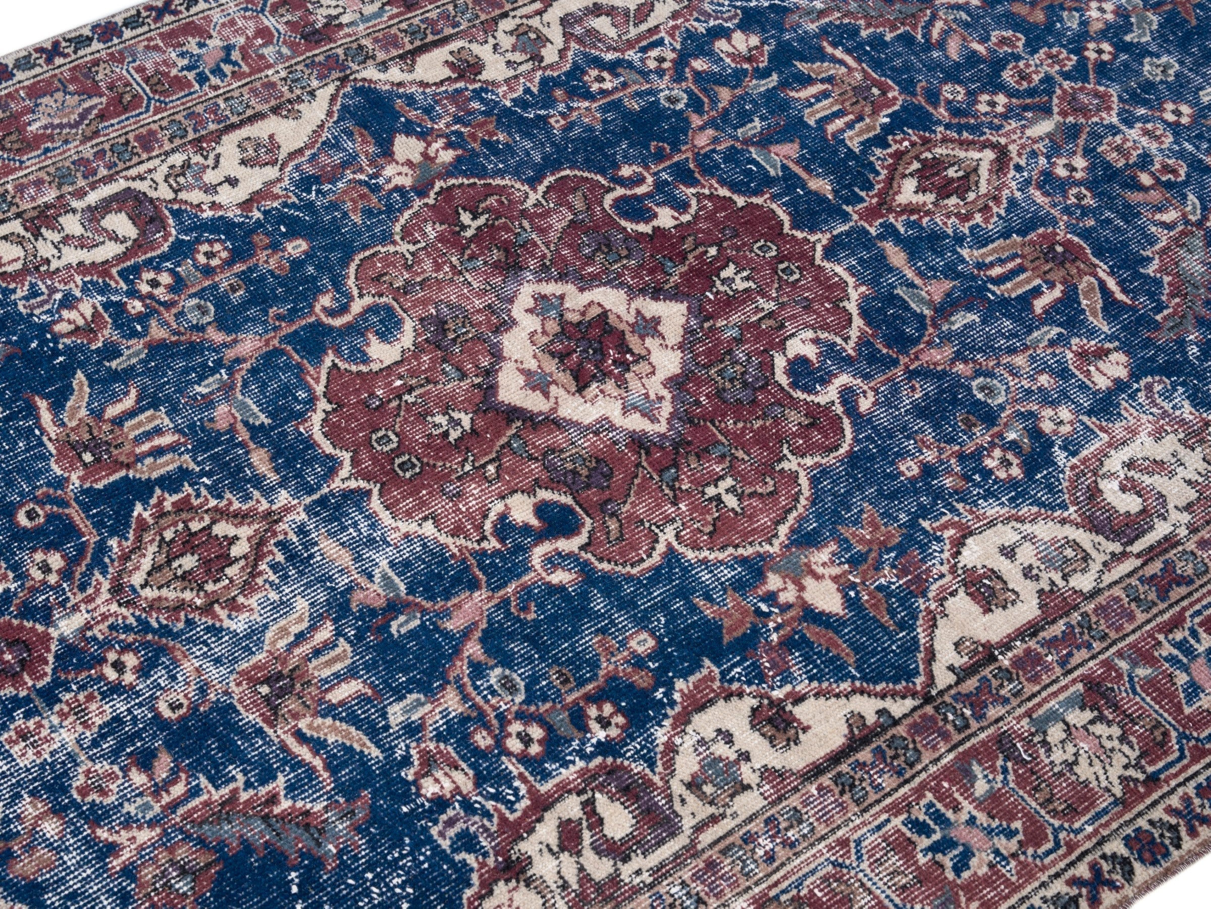 Turkish Isparta area rug in navy and burgundy, view 5 of 10