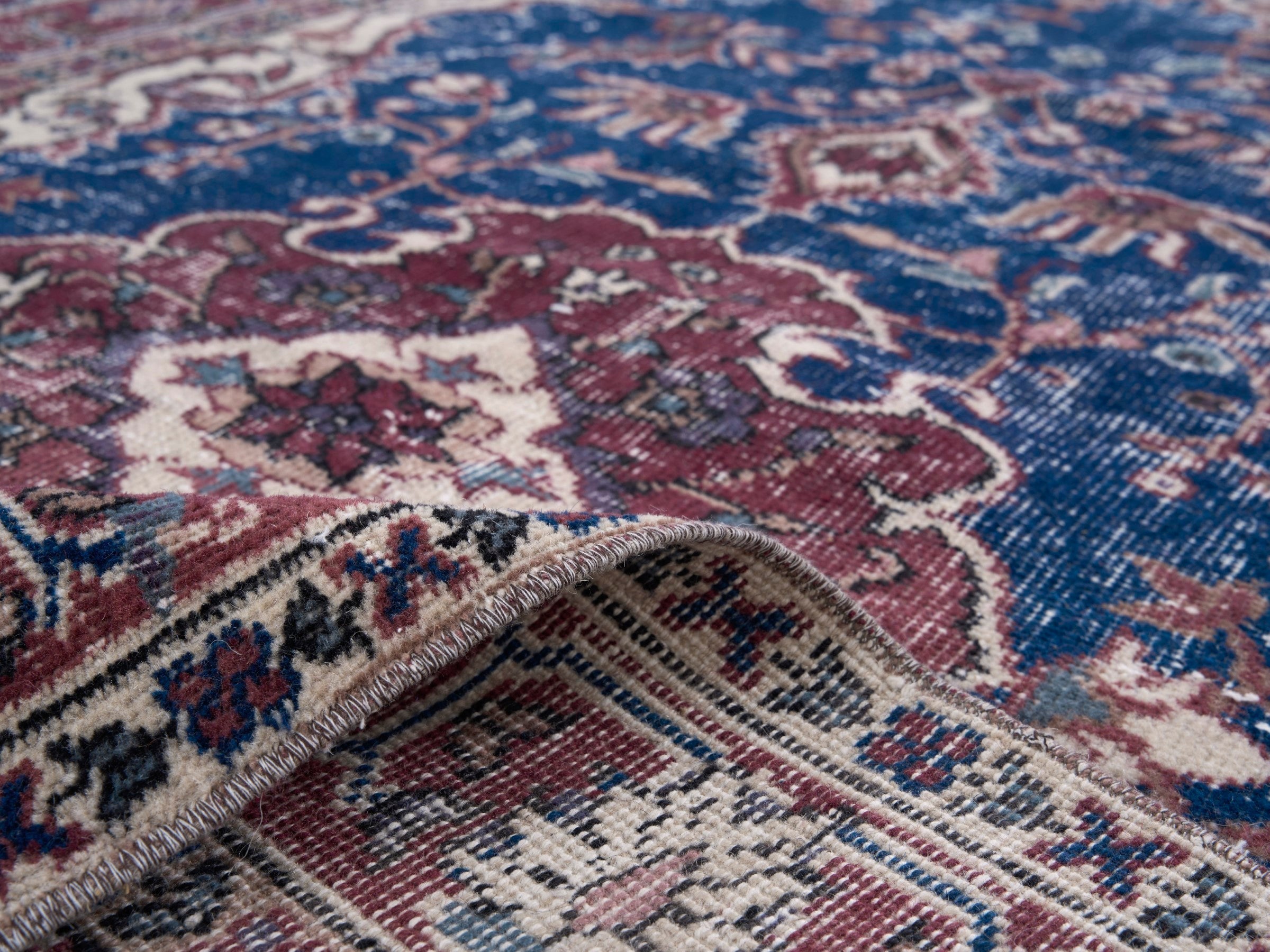Turkish Isparta area rug in navy and burgundy, view 9 of 10