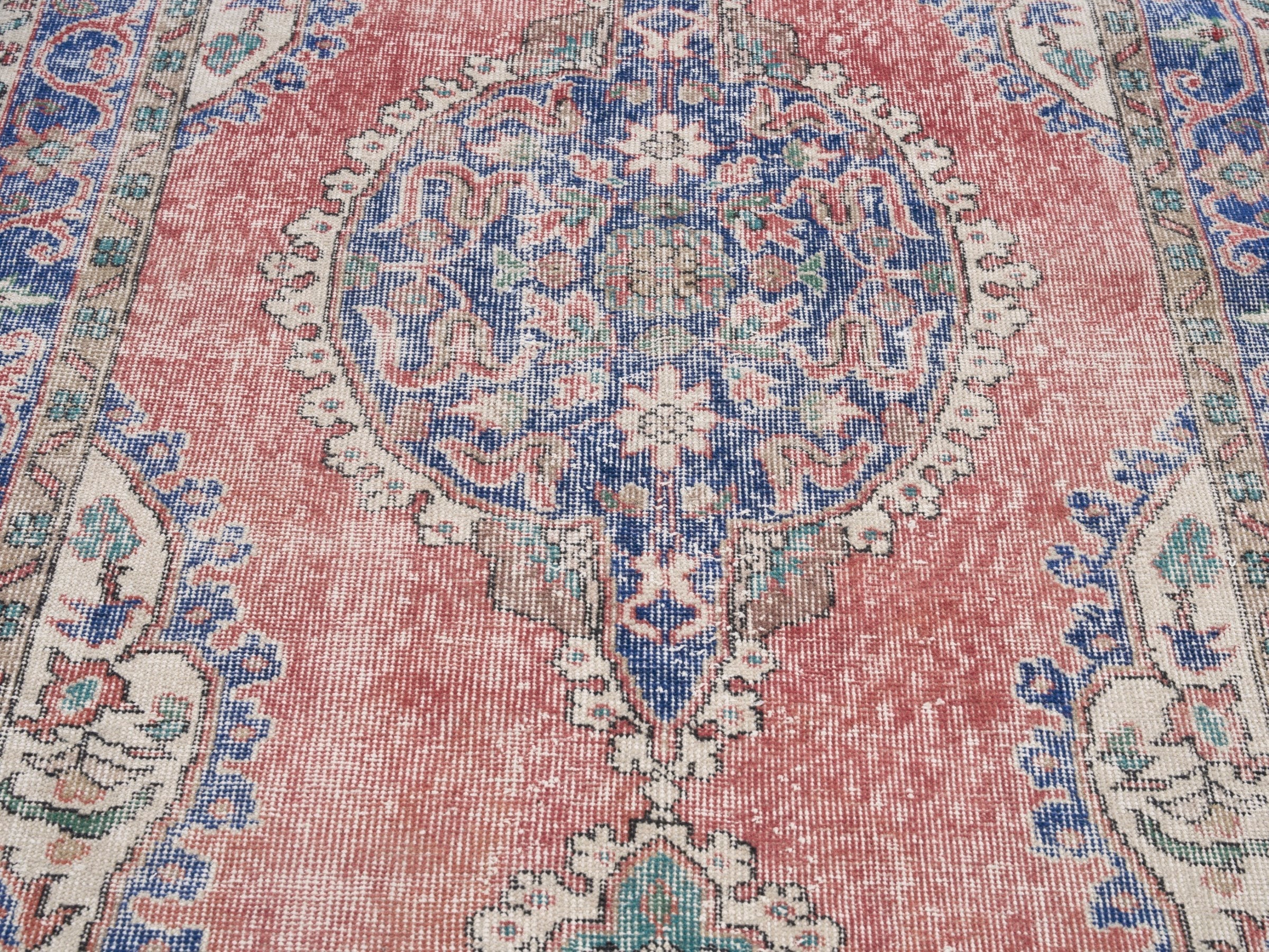 Turkish Isparta area rug in dusty rose and navy, view 4 of 10