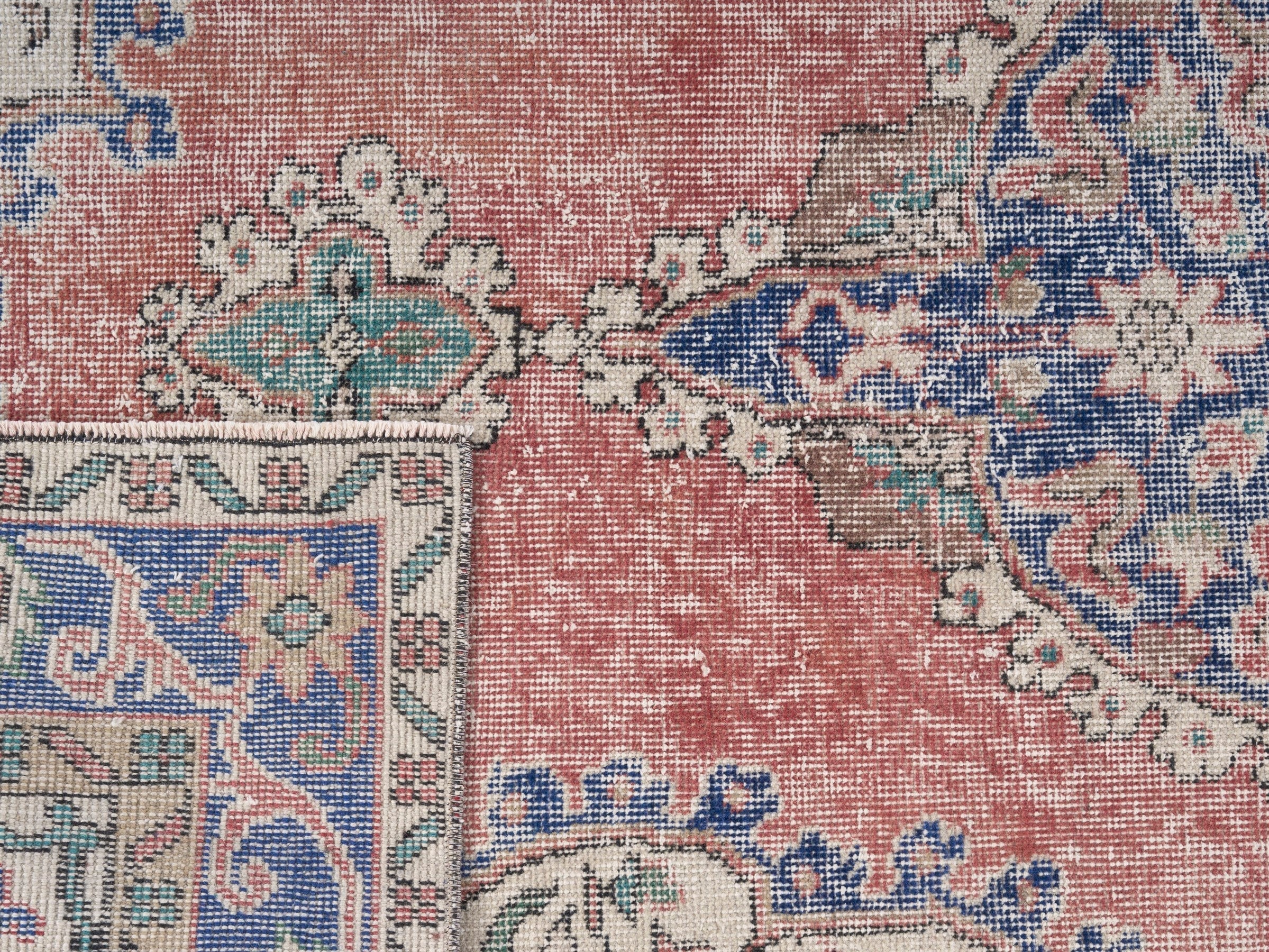 Turkish Isparta area rug in dusty rose and navy, view 10 of 10