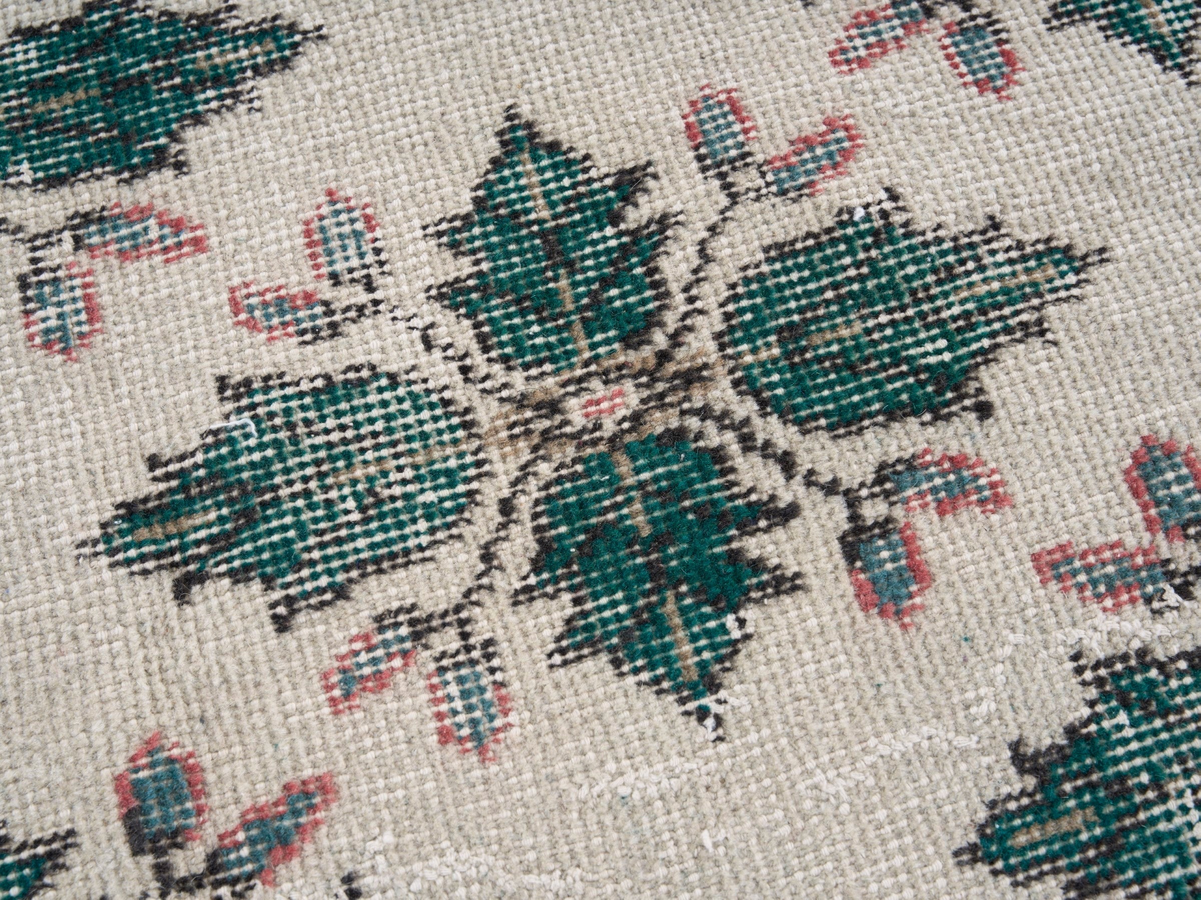 Turkish Isparta accent rug in muted pink and teal, view 7 of 10