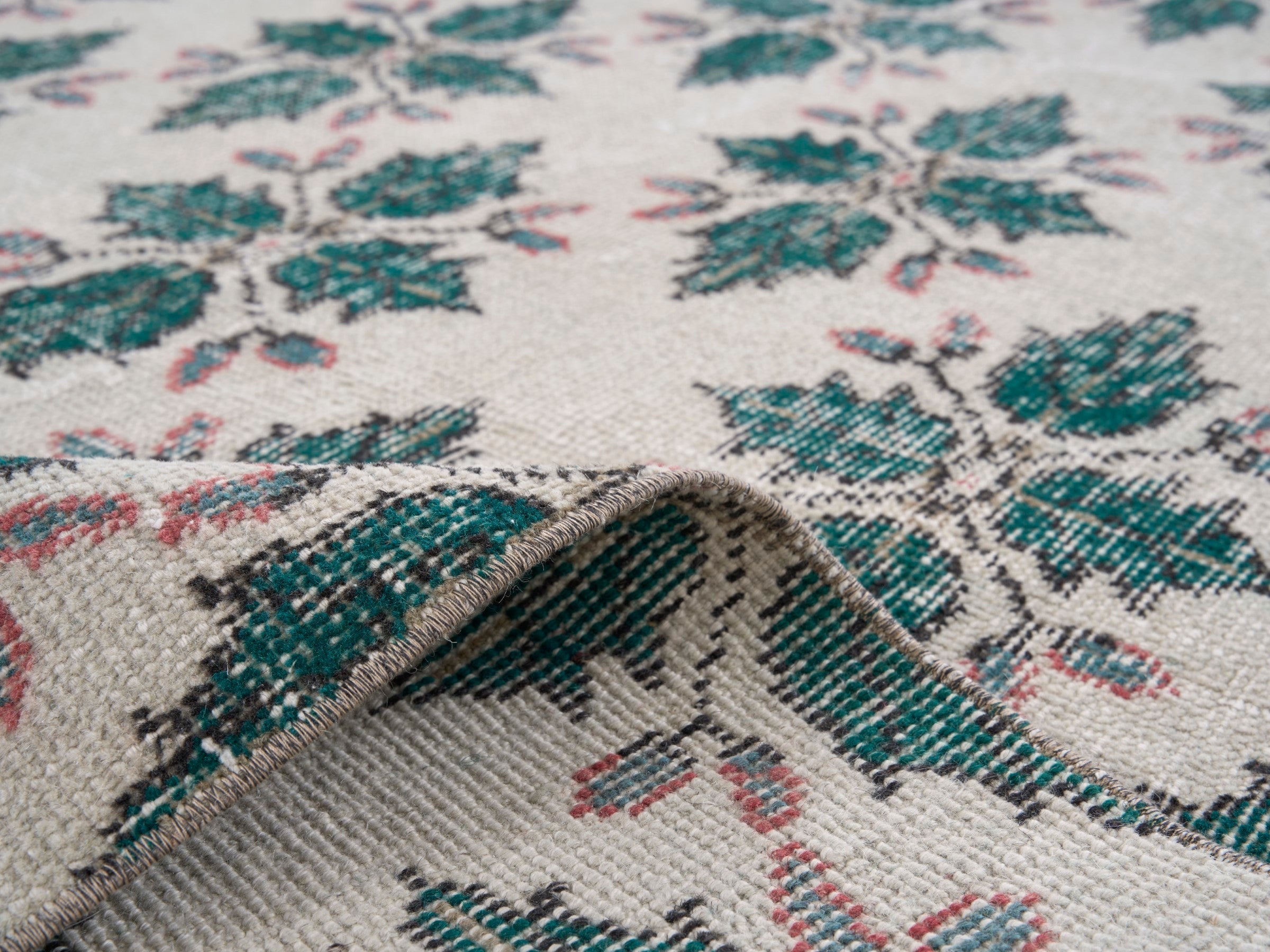 Turkish Isparta accent rug in muted pink and teal, view 9 of 10