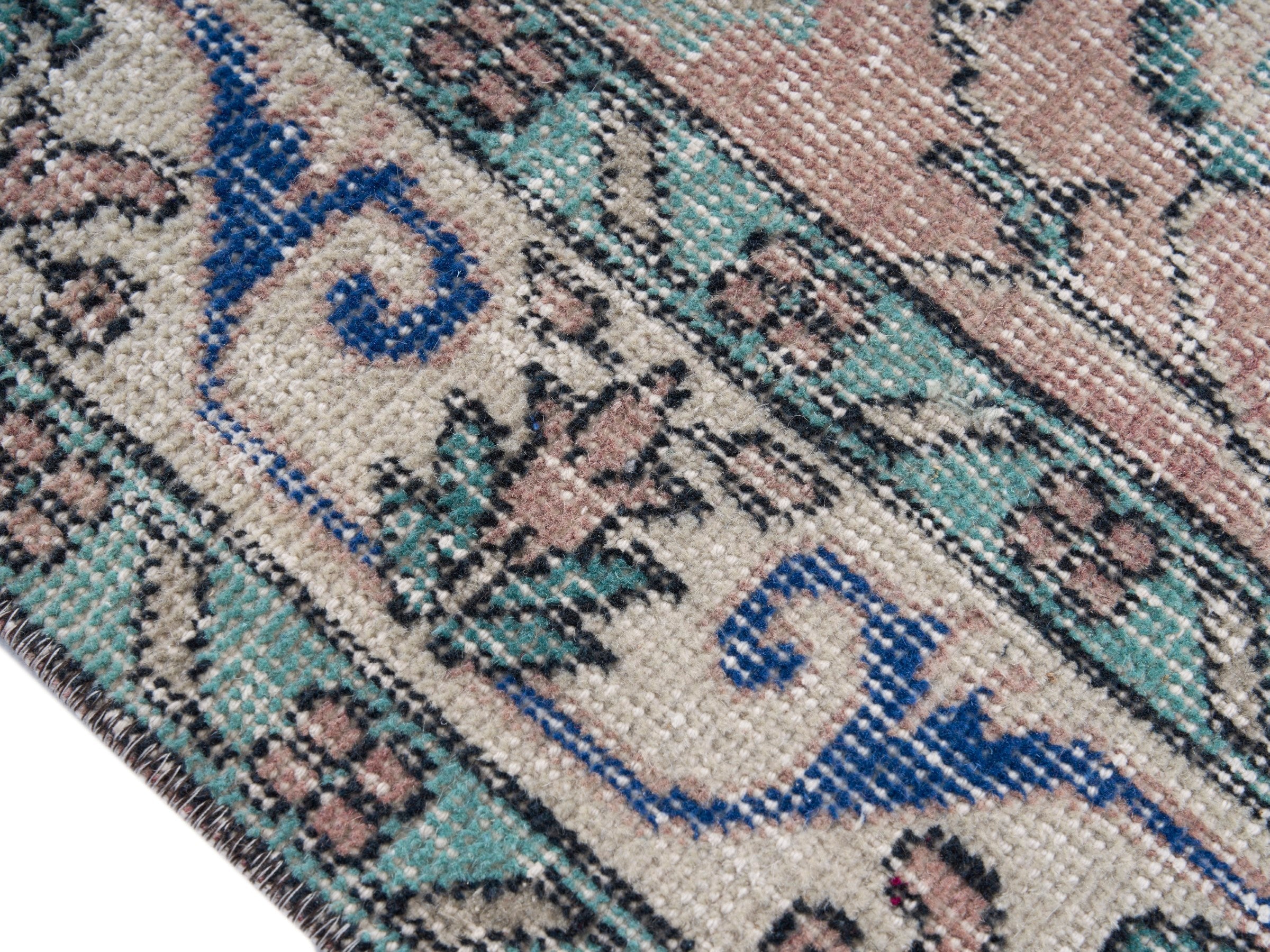 Turkish Isparta area rug in muted pink and dusty rose, view 6 of 10