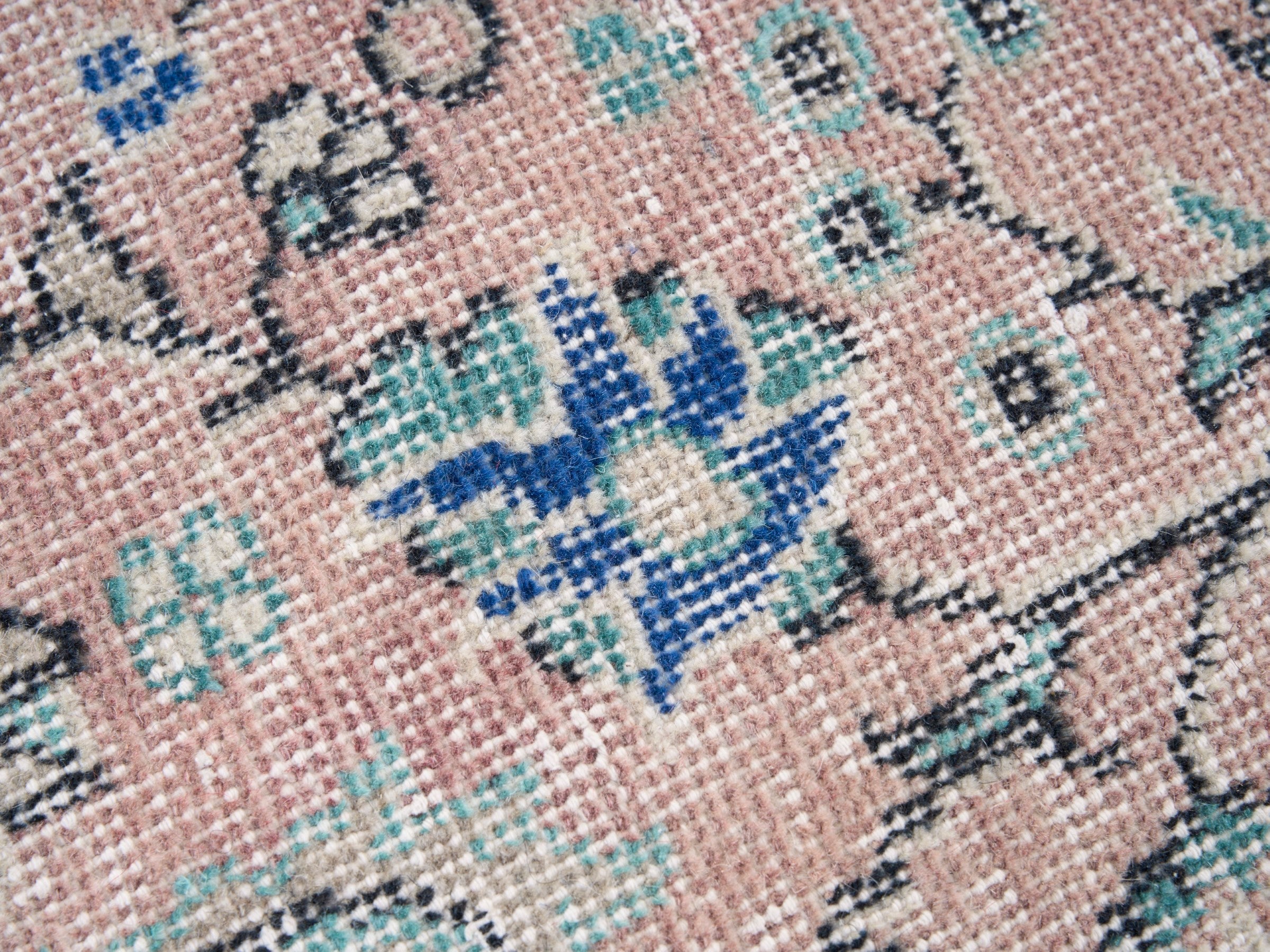 Turkish Isparta area rug in muted pink and dusty rose, view 7 of 10
