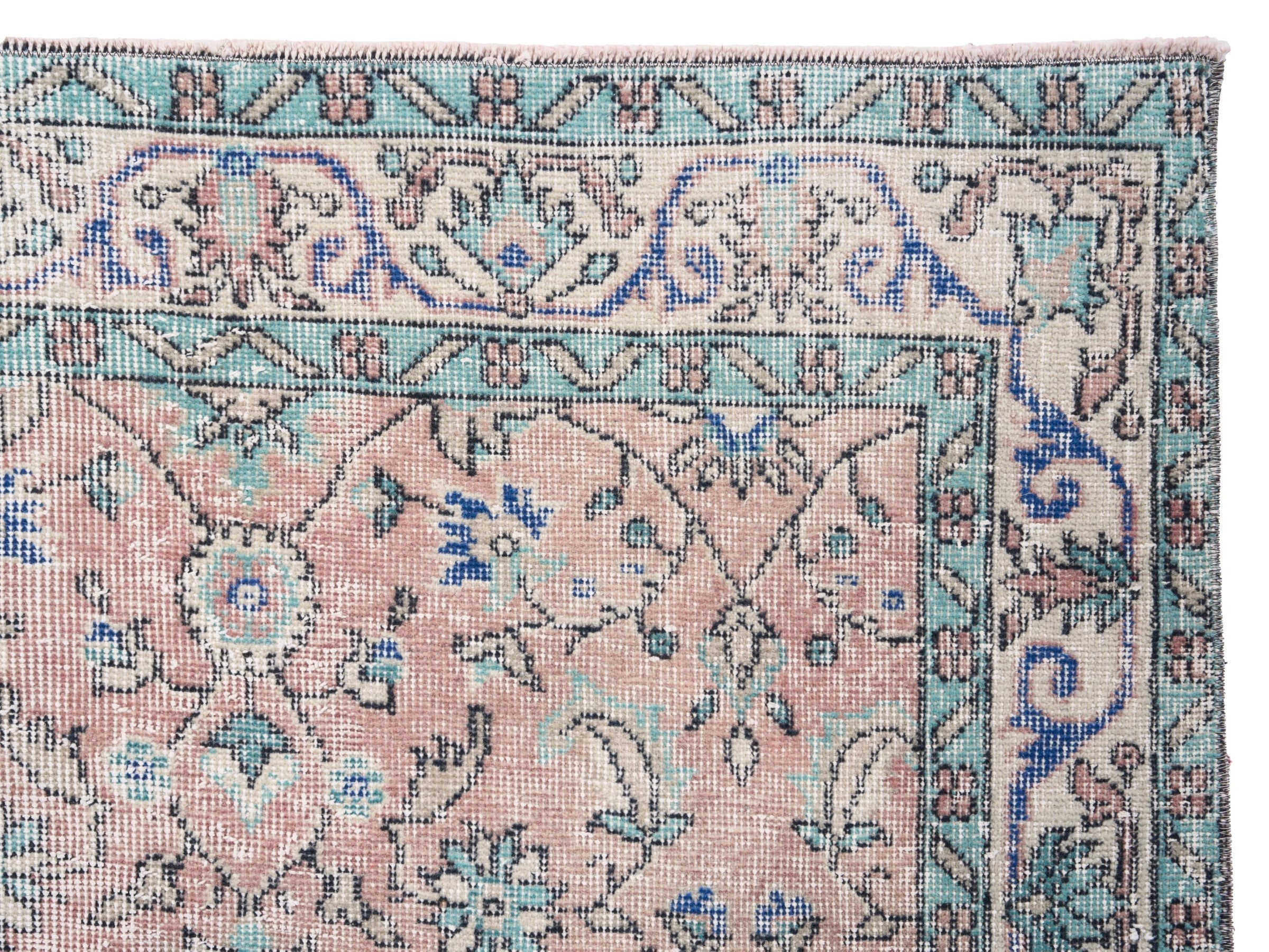 Turkish Isparta area rug in muted pink and dusty rose, view 8 of 10