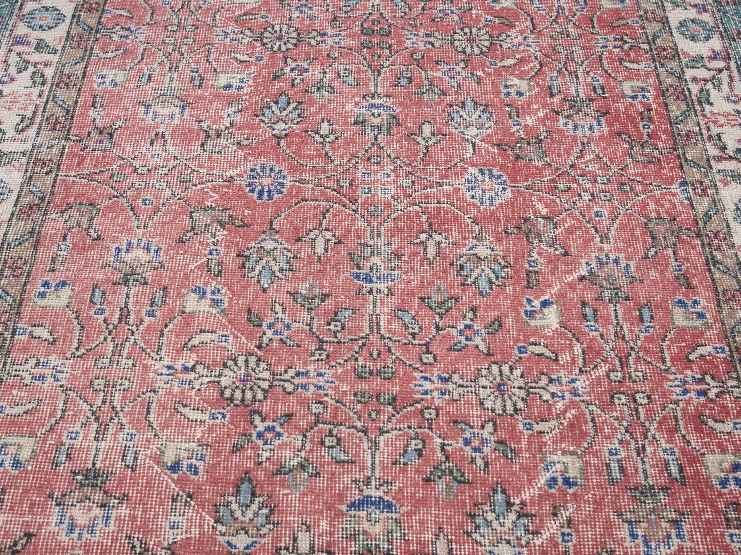 Turkish Isparta area rug in faded red and cream, view 4 of 10