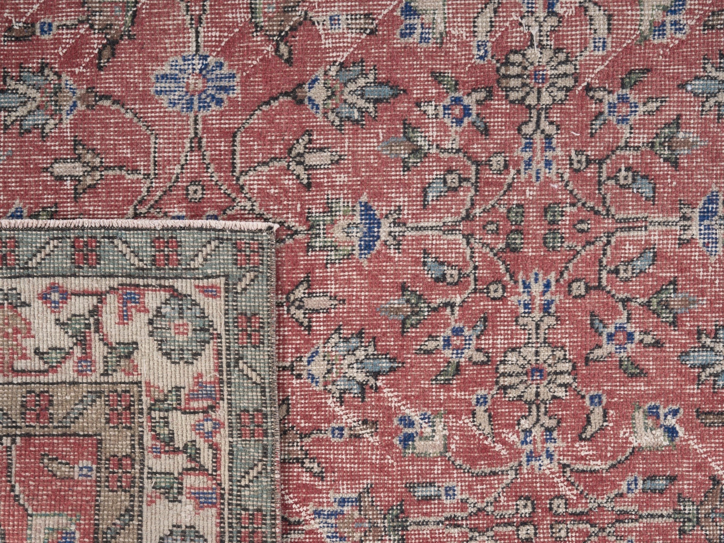 Turkish Isparta area rug in faded red and cream, view 10 of 10