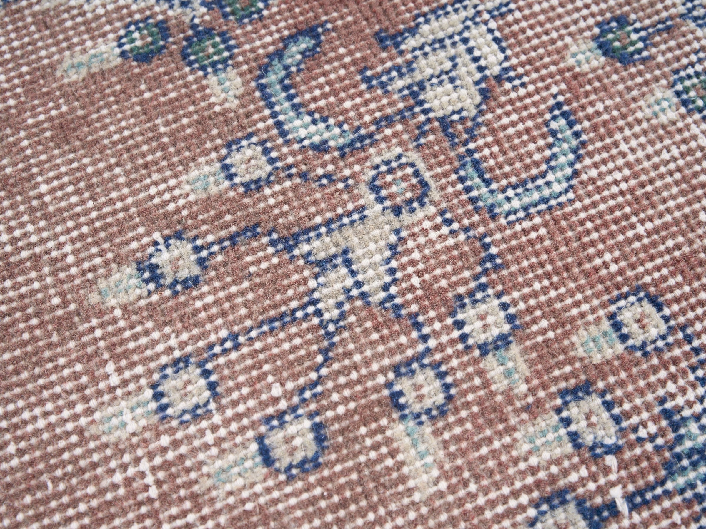 Turkish Isparta area rug in rust and ivory, view 7 of 10