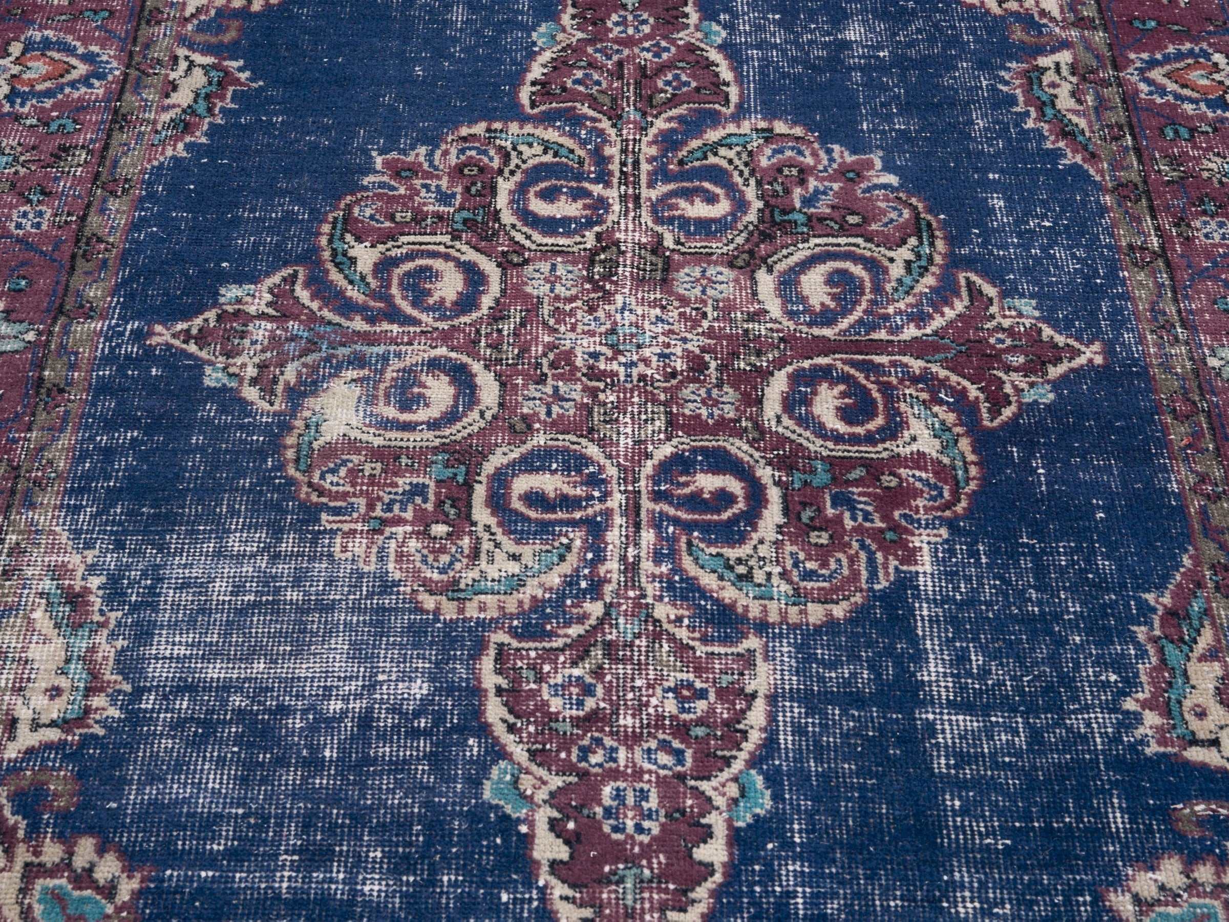 Turkish Isparta accent rug in navy and burgundy, view 4 of 10