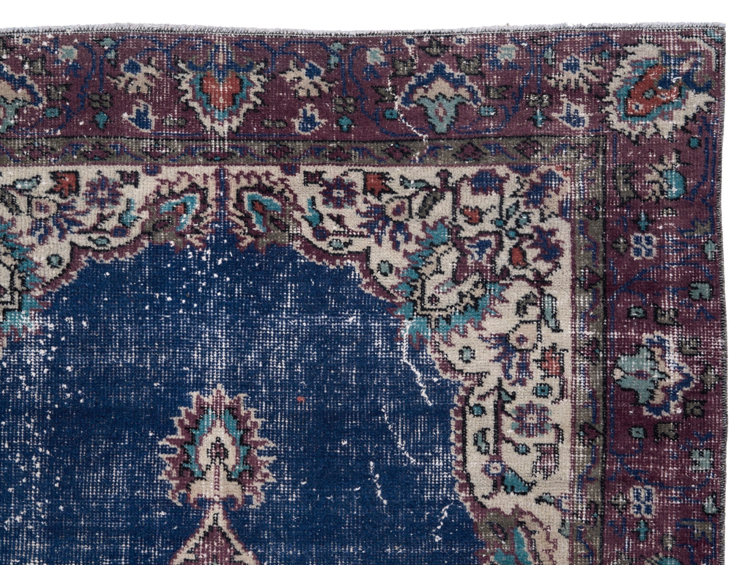 Turkish Isparta accent rug in navy and burgundy, view 8 of 10