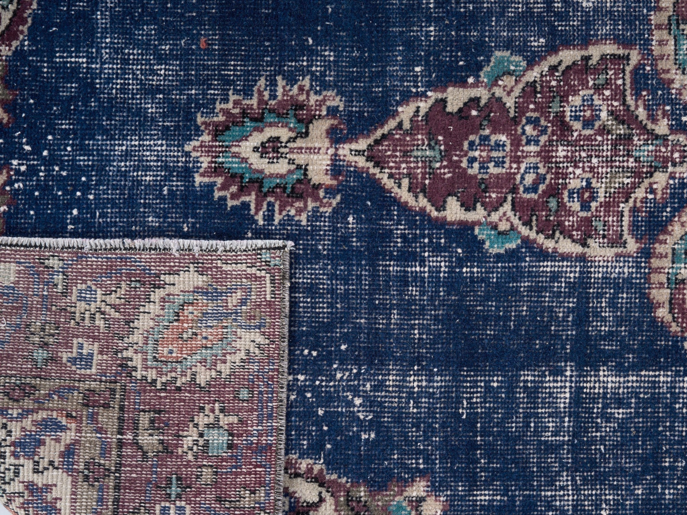 Turkish Isparta accent rug in navy and burgundy, view 10 of 10