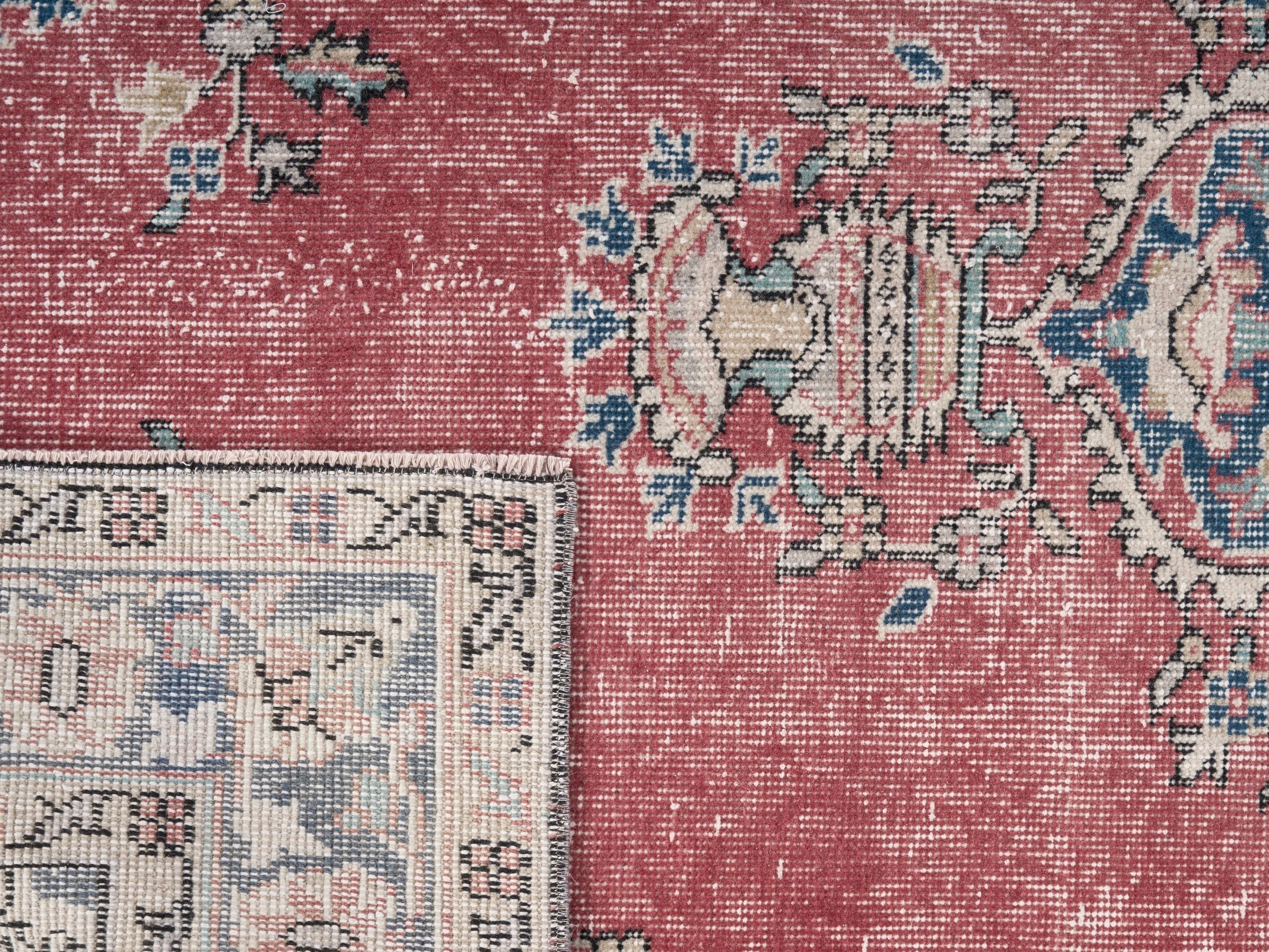 Turkish Isparta area rug in dusty rose and navy, view 10 of 10