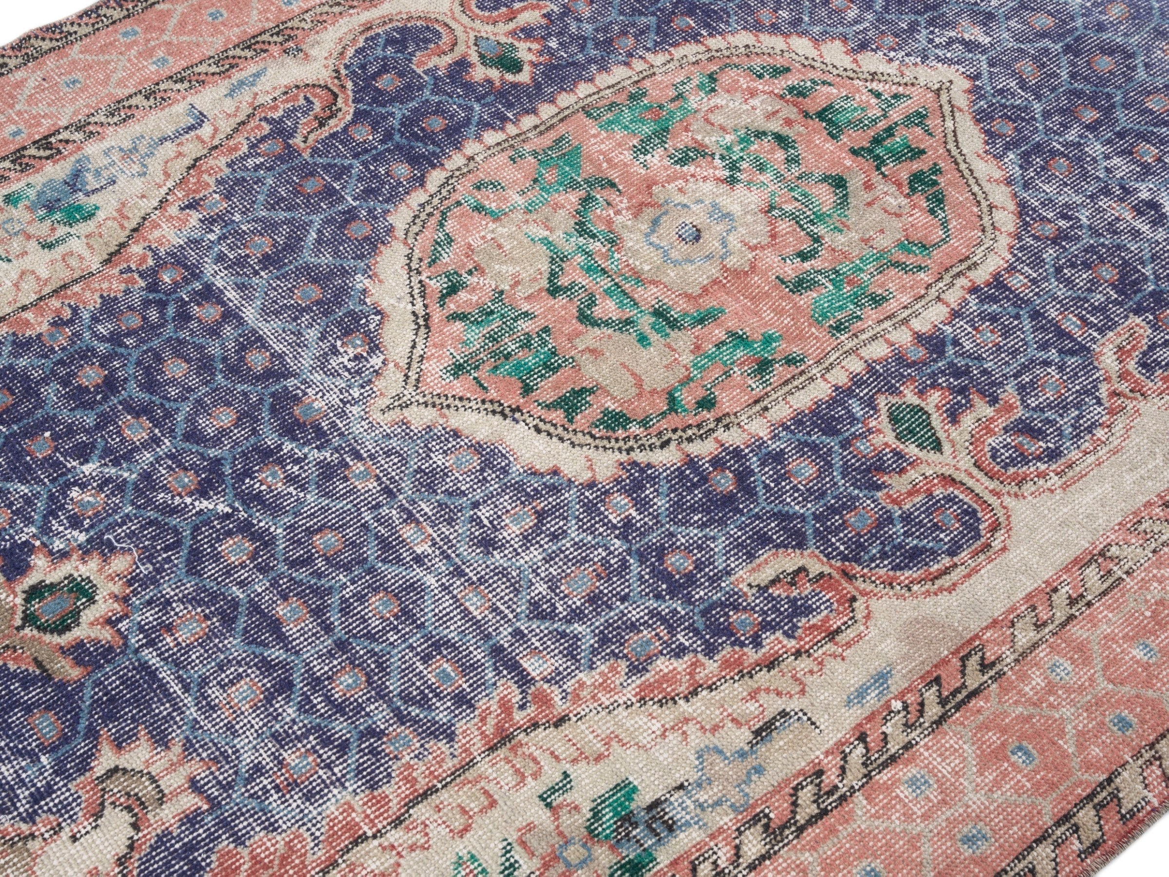 Turkish Isparta area rug in deep indigo and rose, view 5 of 10