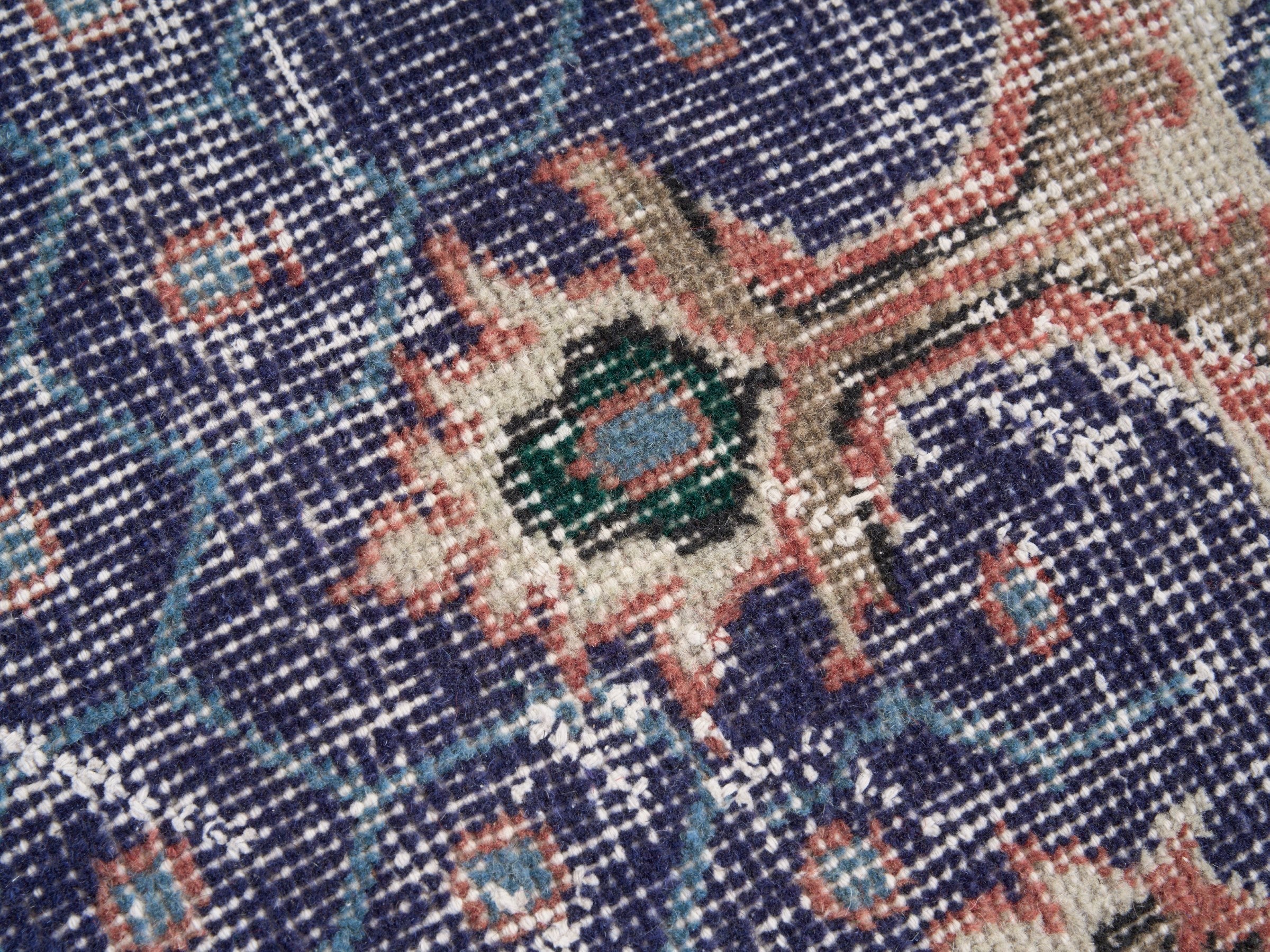 Turkish Isparta area rug in deep indigo and rose, view 7 of 10